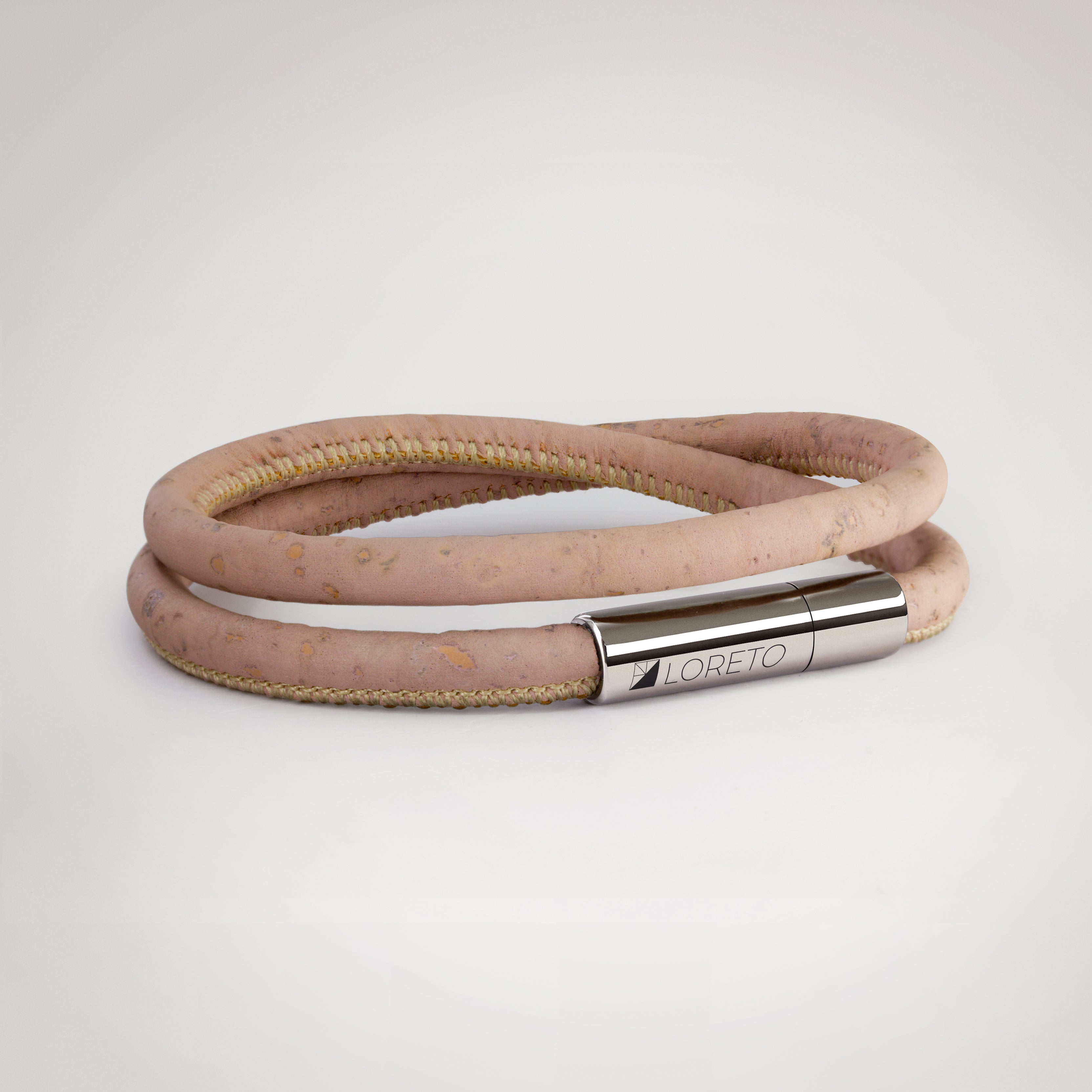 Double pink bracelet made from natural cork fiber and titanium.