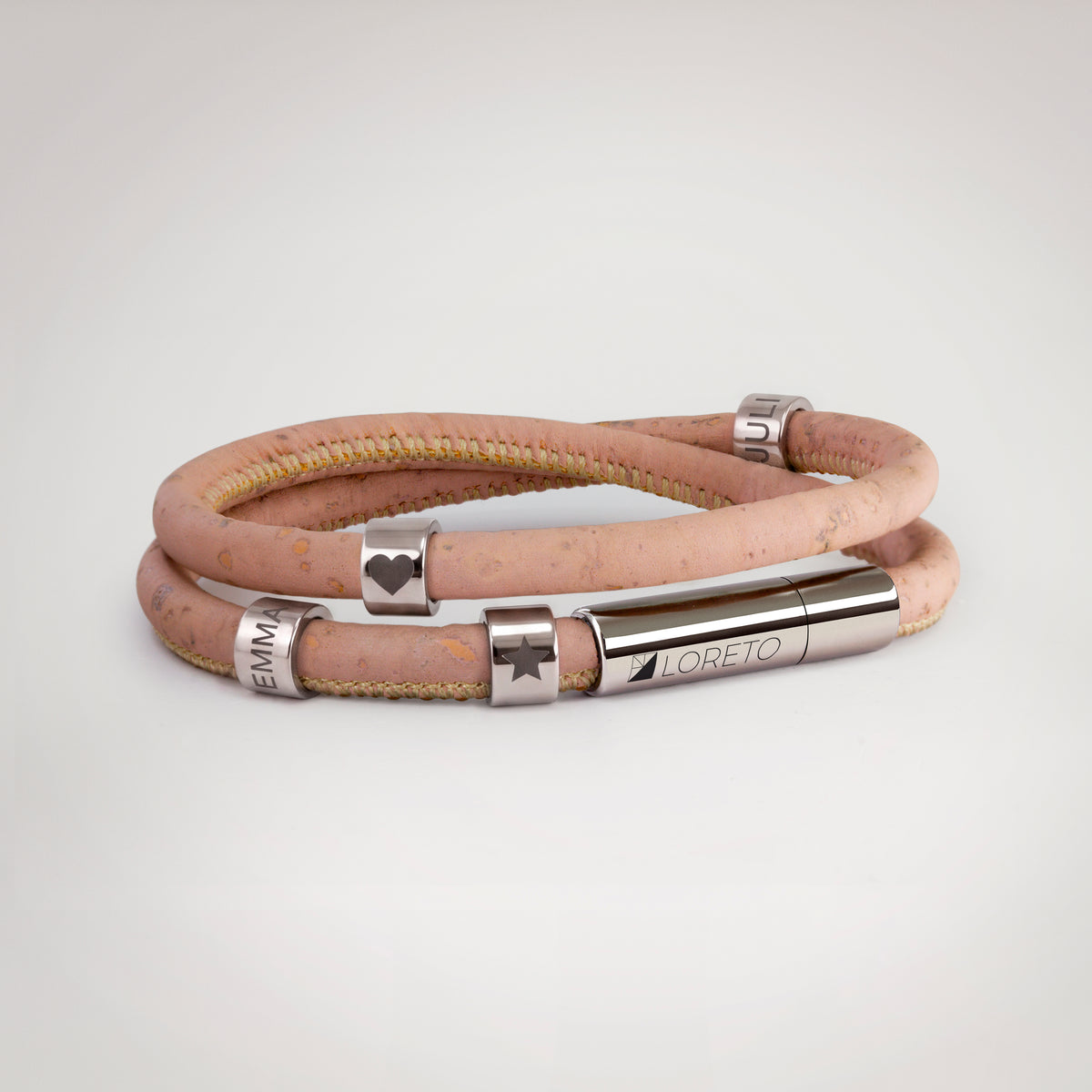 Double pink bracelet made from natural cork fiber and titanium.