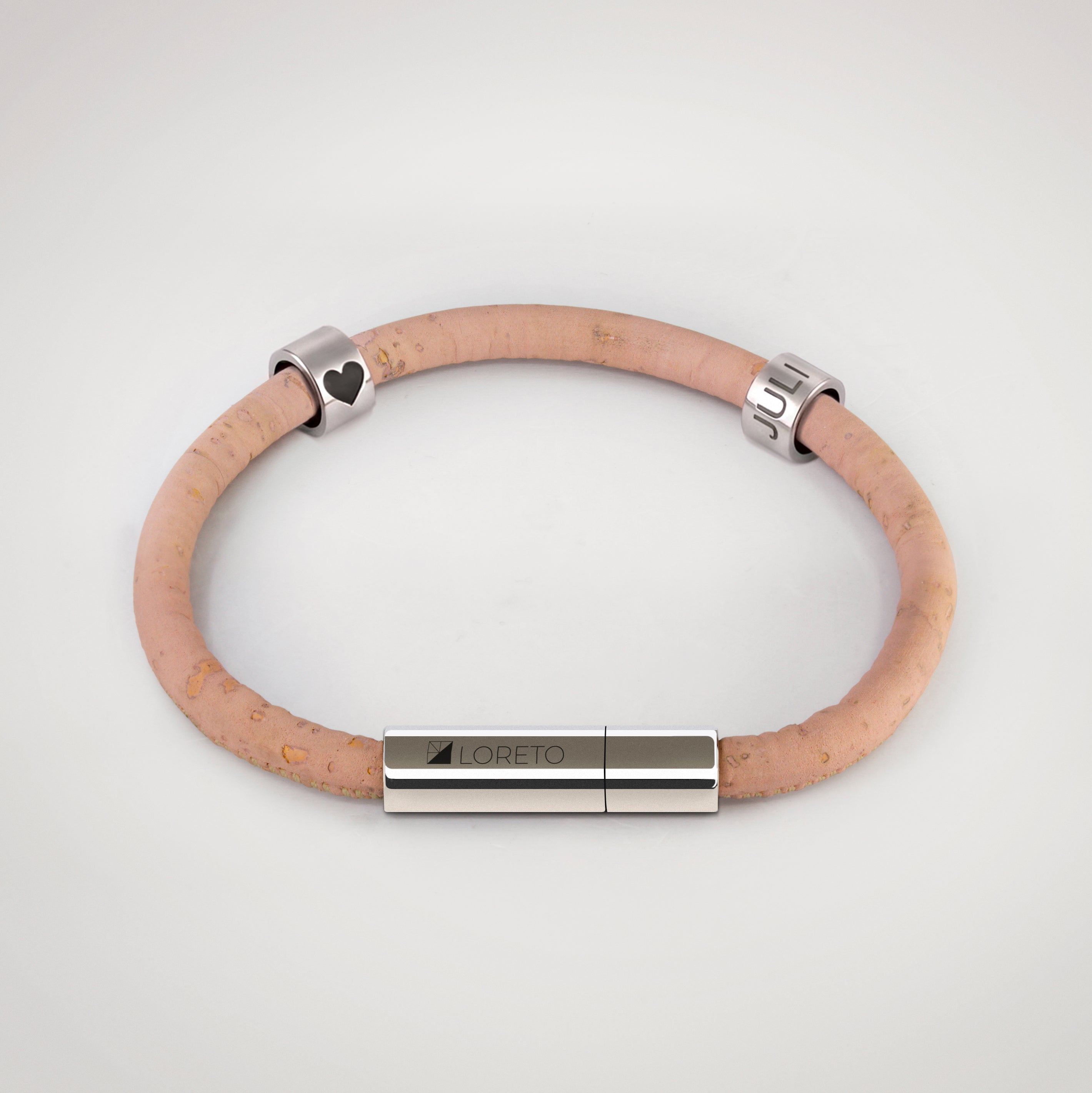Simple pink bracelet made from natural cork fiber and titanium.