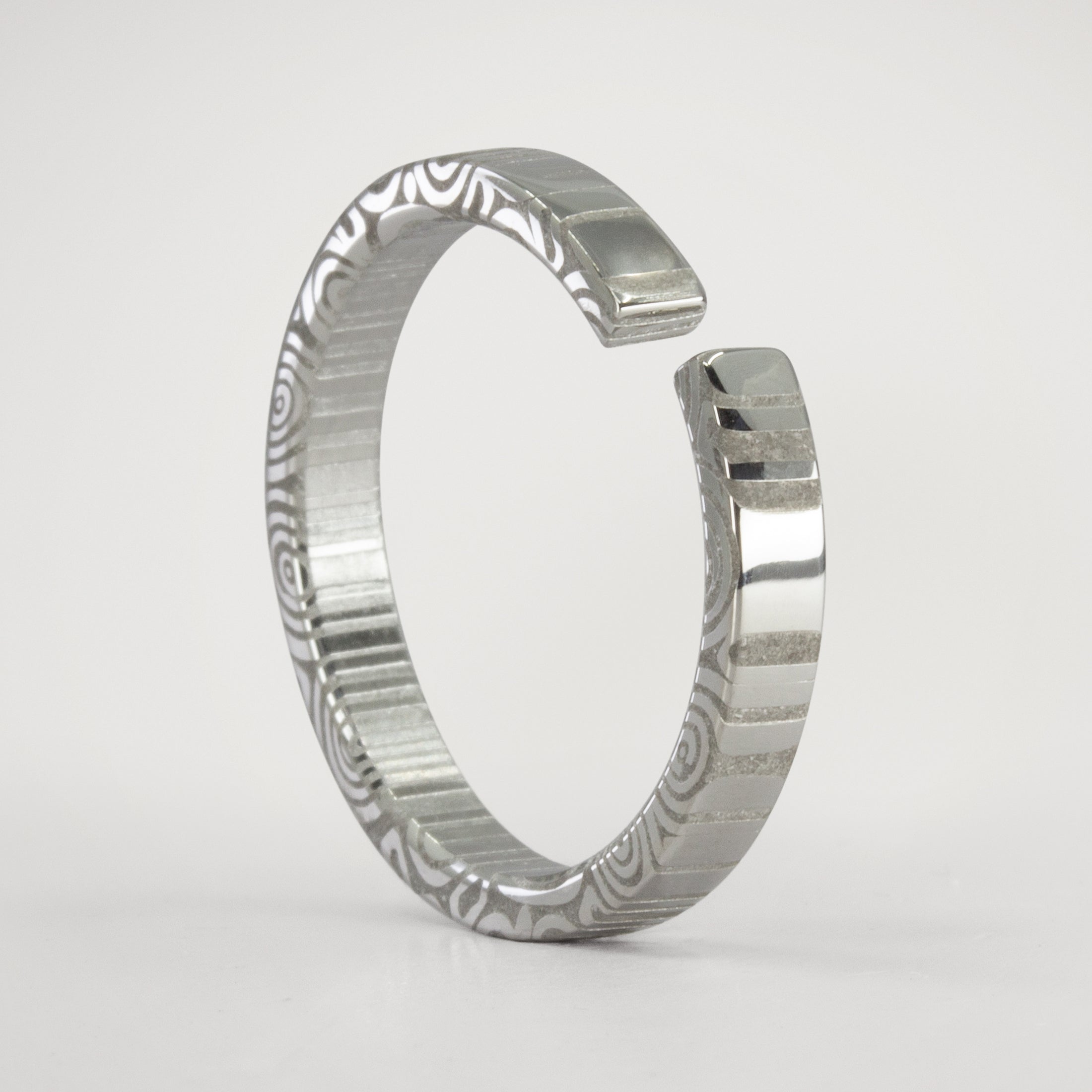 Split damascus steel flat ring