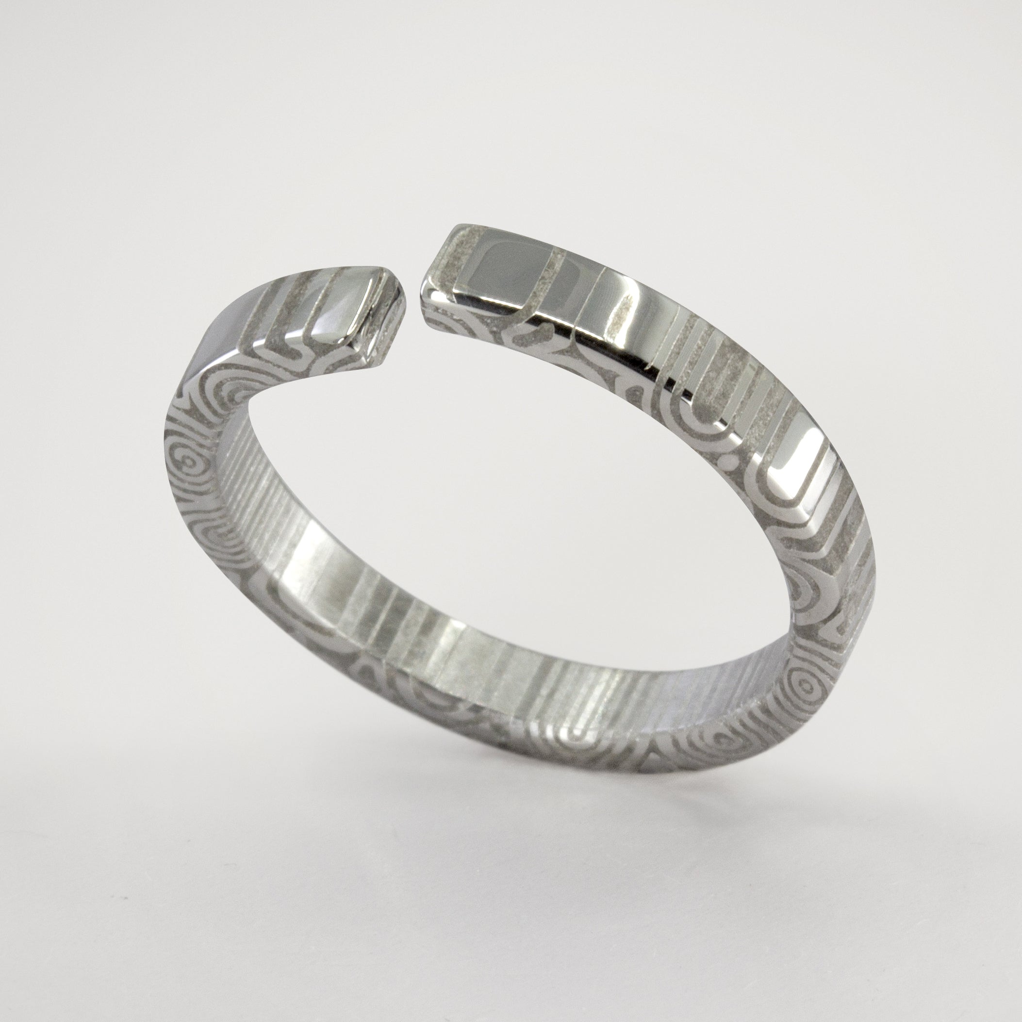 Split damascus steel flat ring