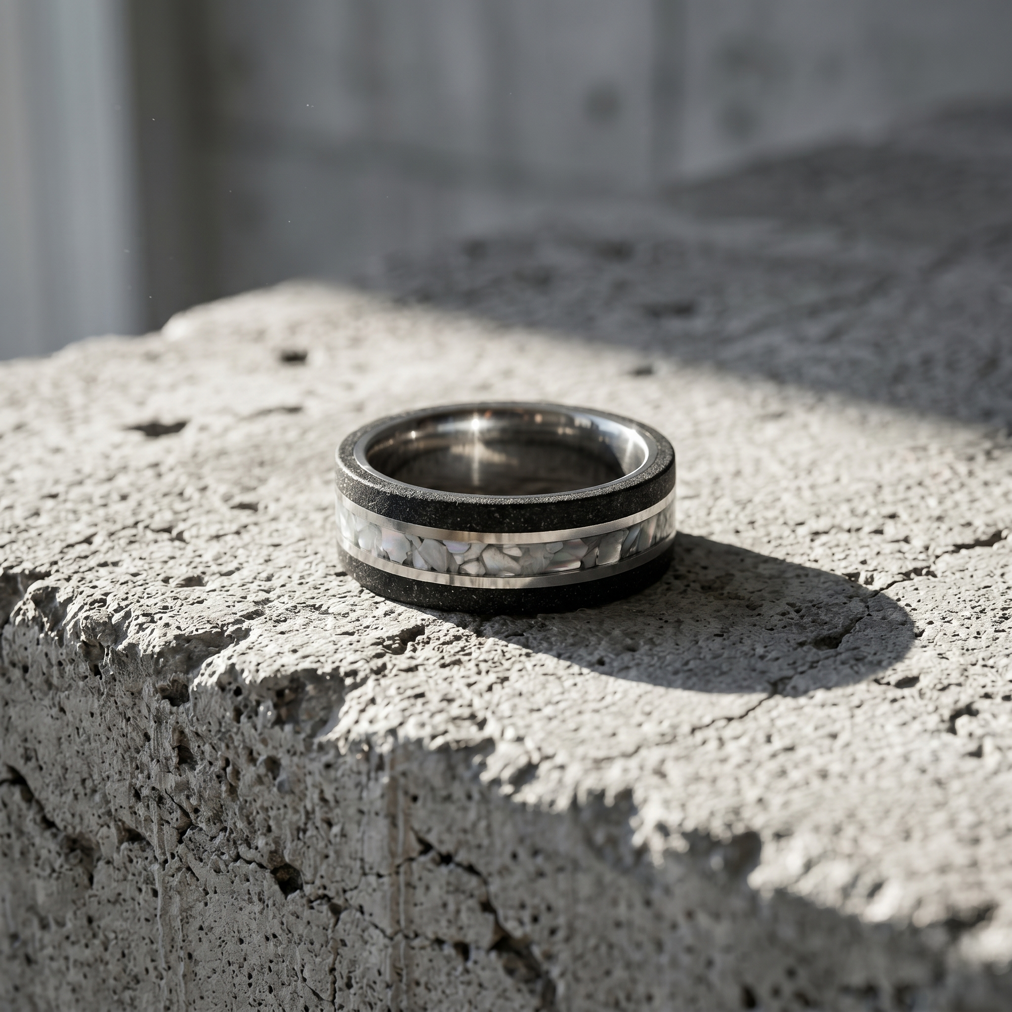 Nacre black concrete and titanium ring