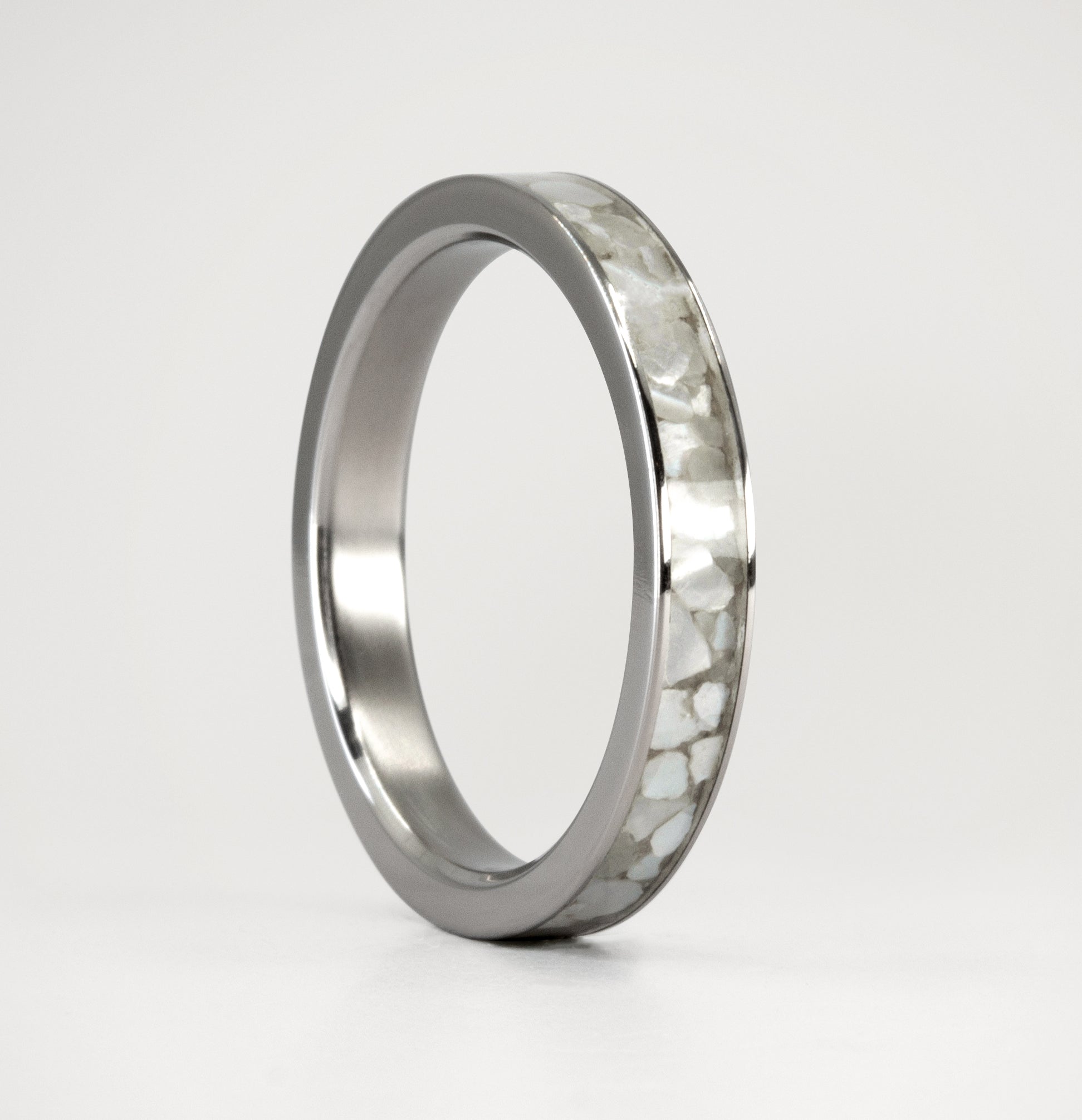 Nacre and titanium ring