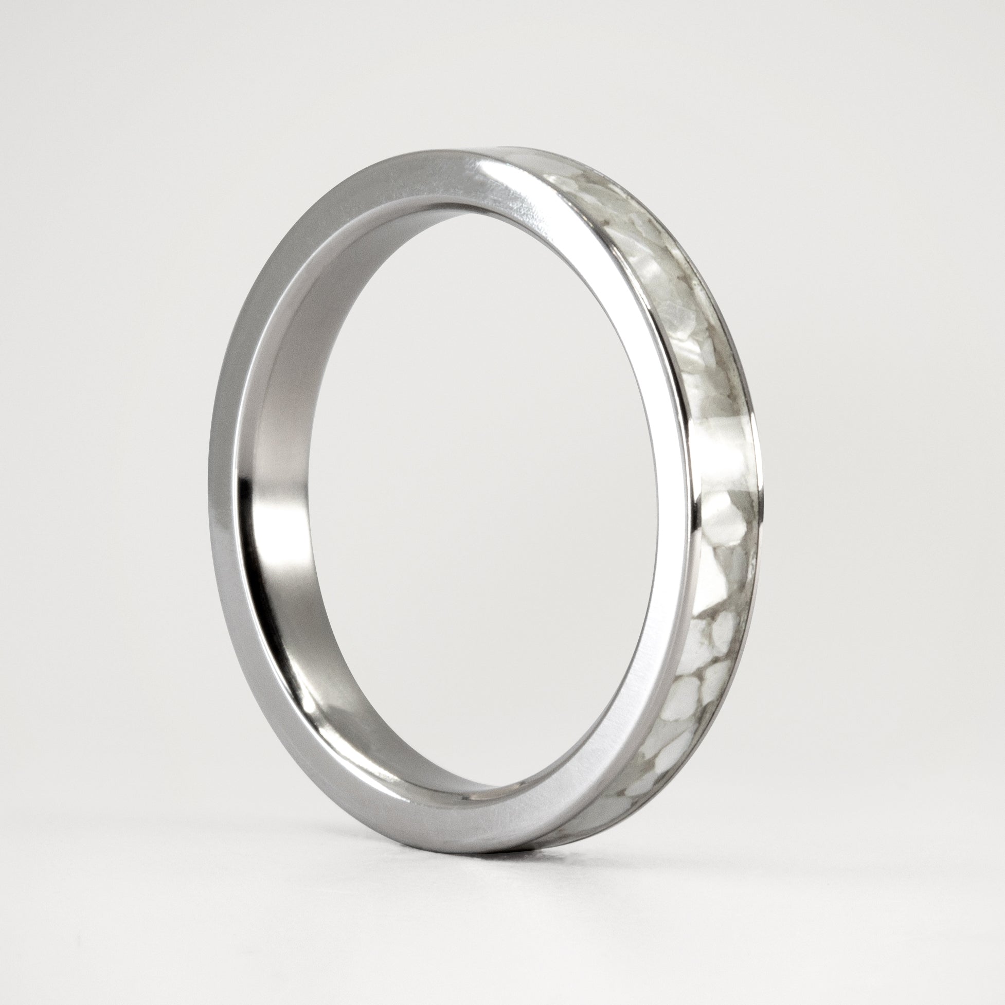 Nacre and titanium ring