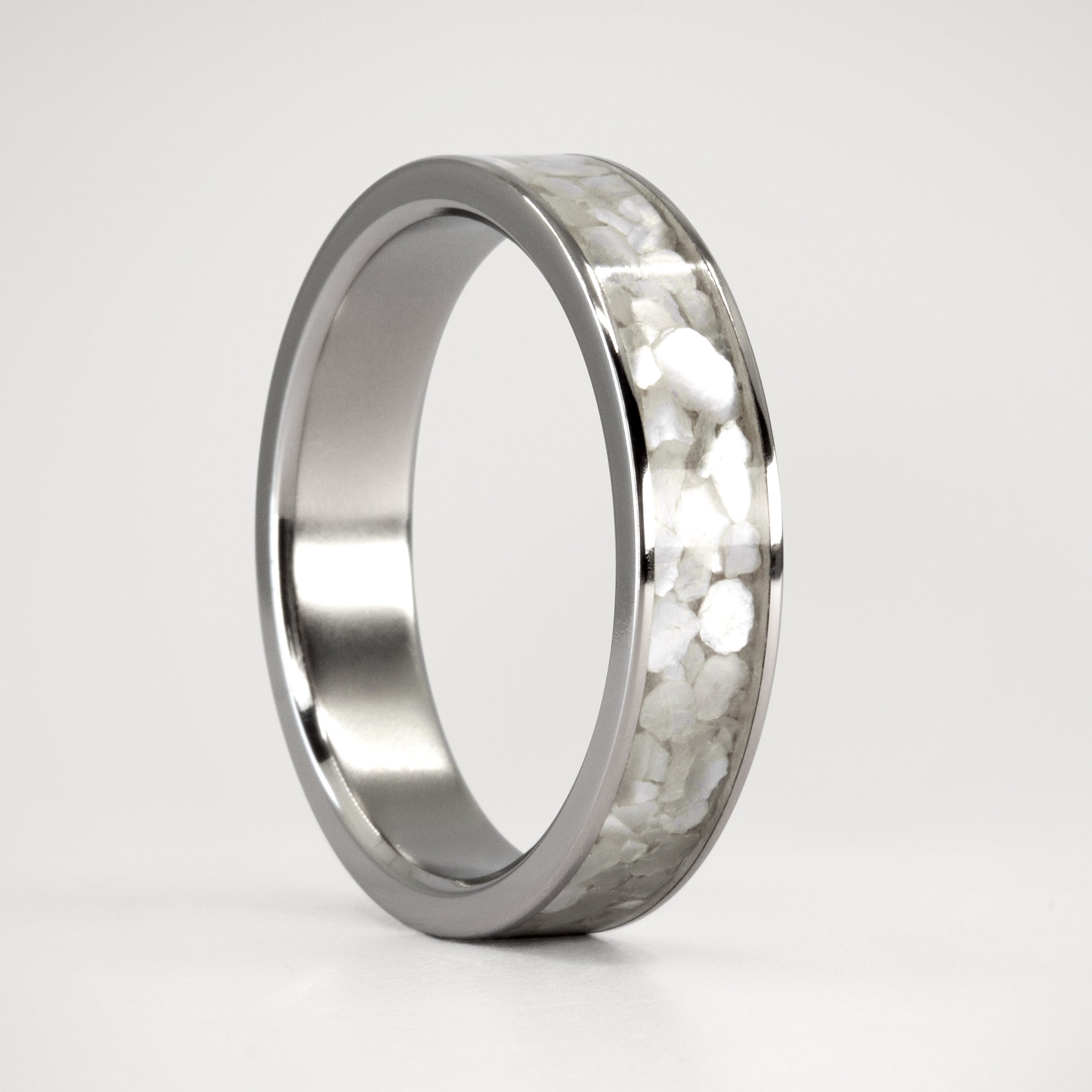 Nacre and titanium ring