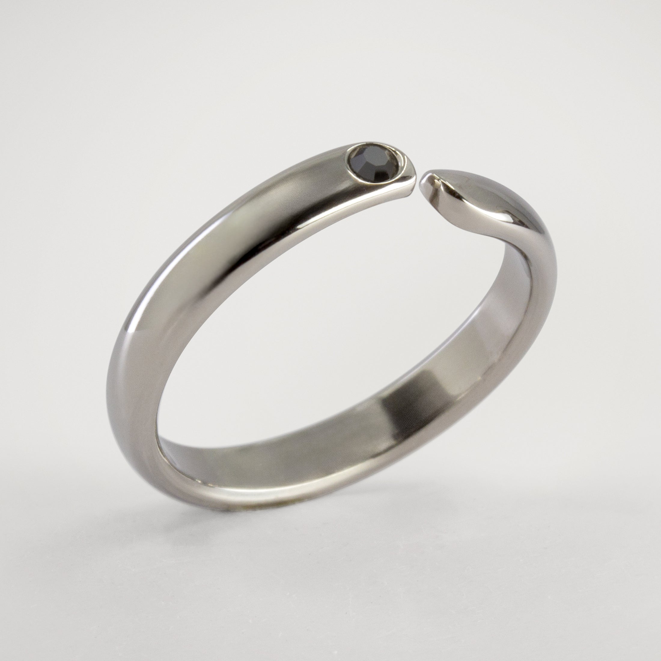Split titanium dome ring with black crystal