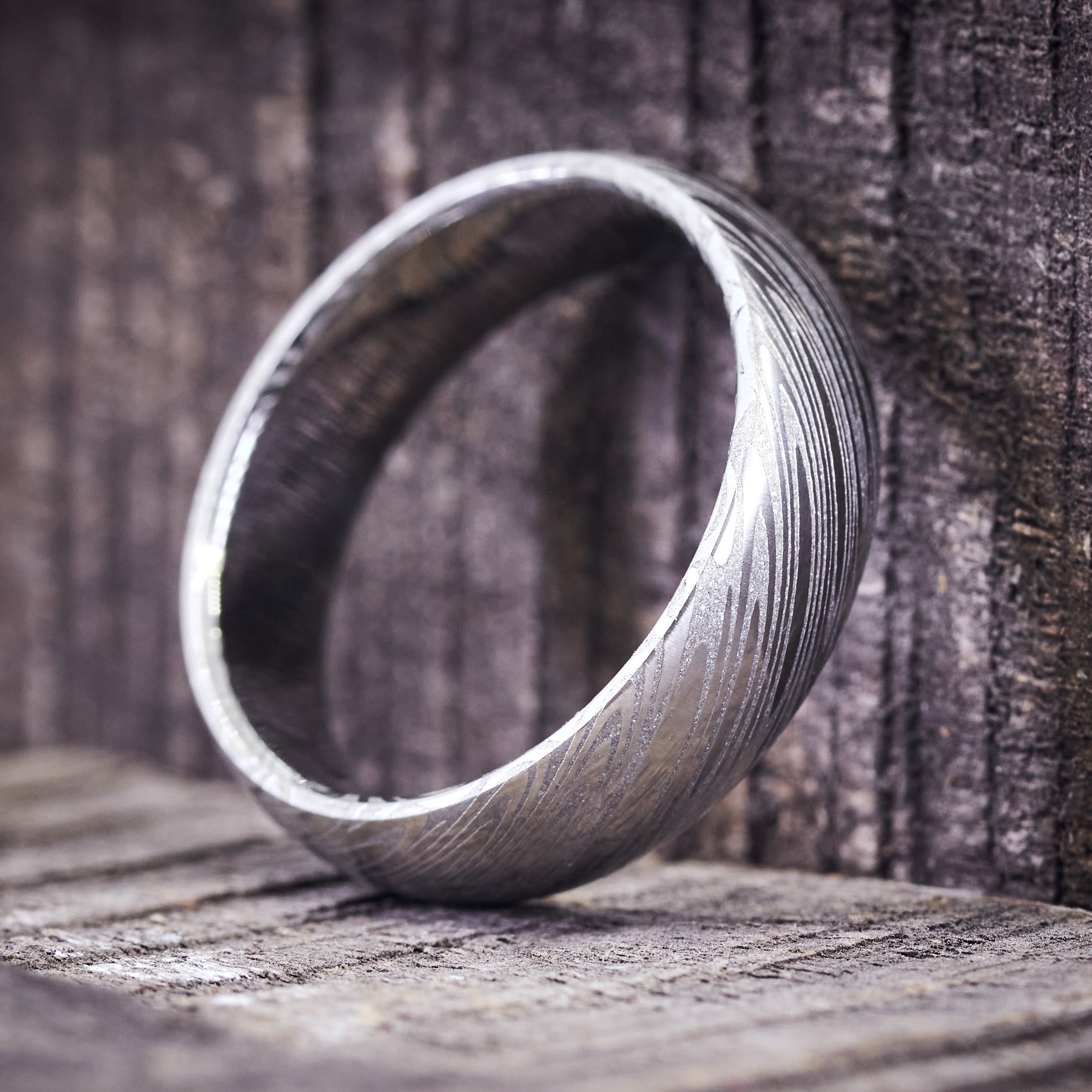 Polished Damascus steel men ring