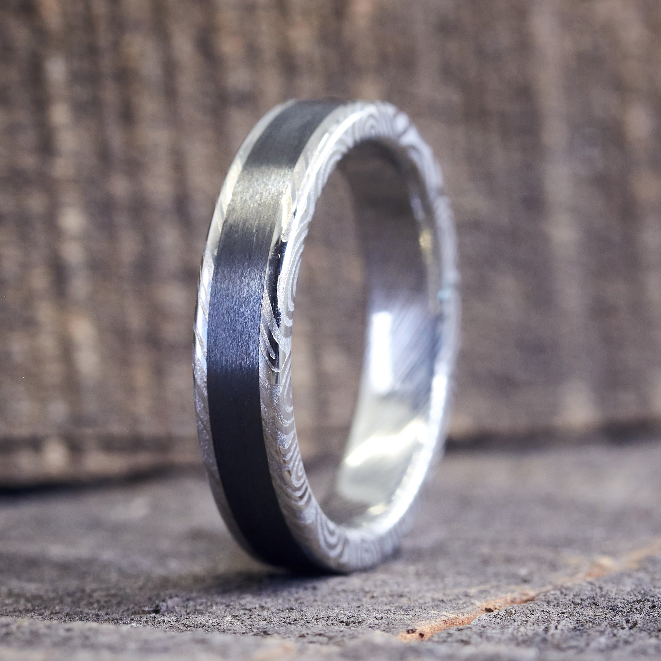 Polished Damascus steel and Carbon fiber women ring