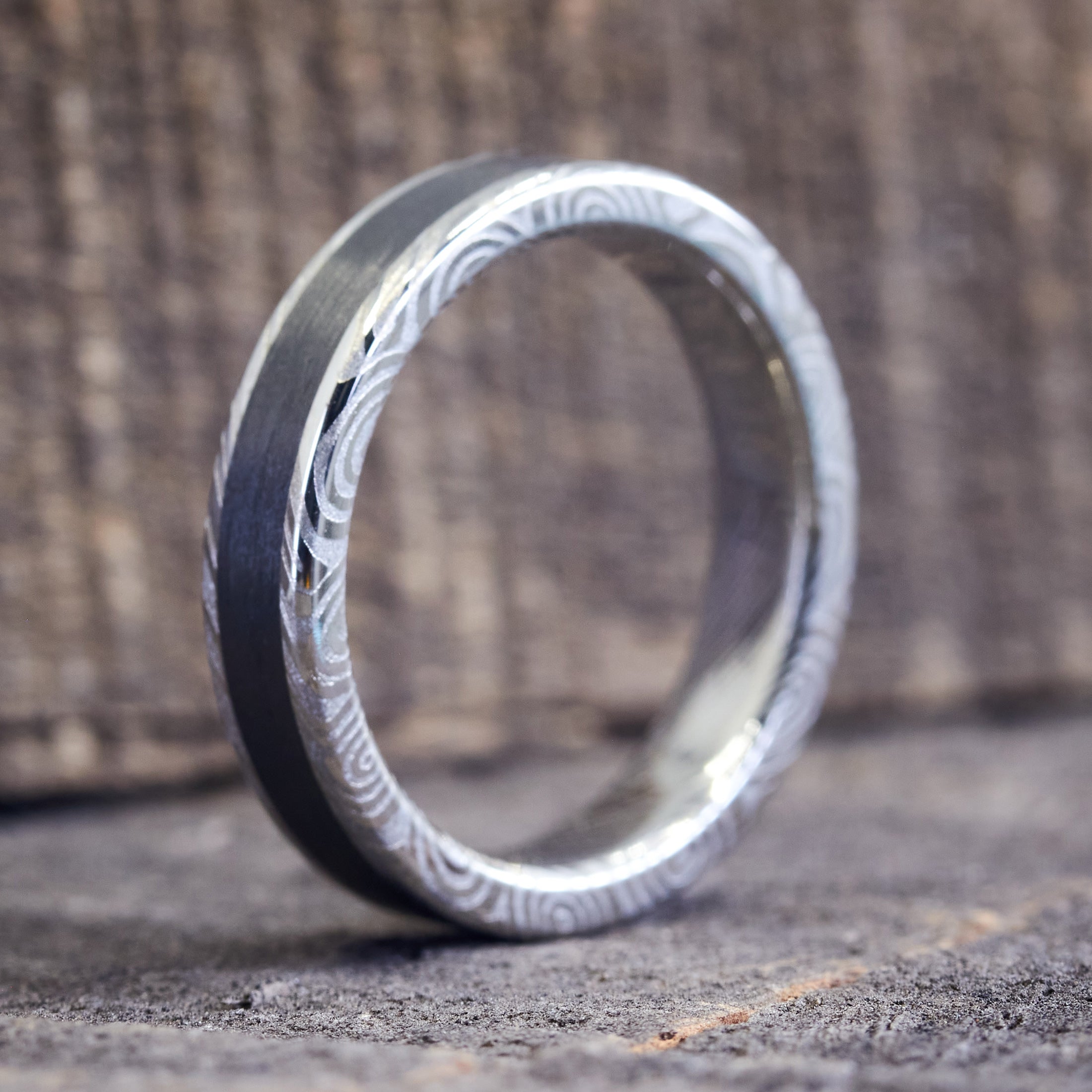 Polished Damascus steel and Carbon fiber women ring