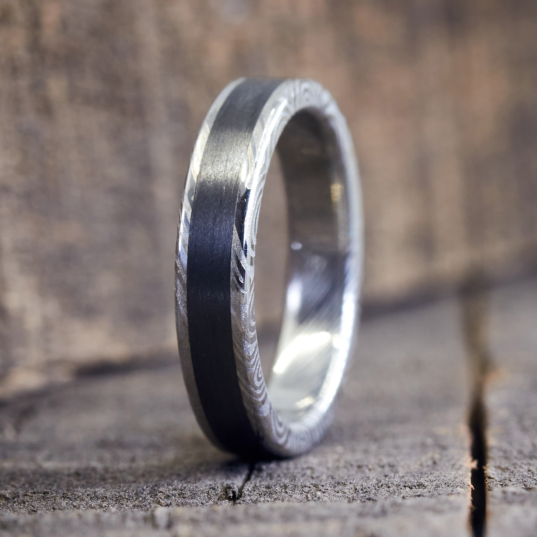 Polished Damascus steel and Carbon fiber women ring