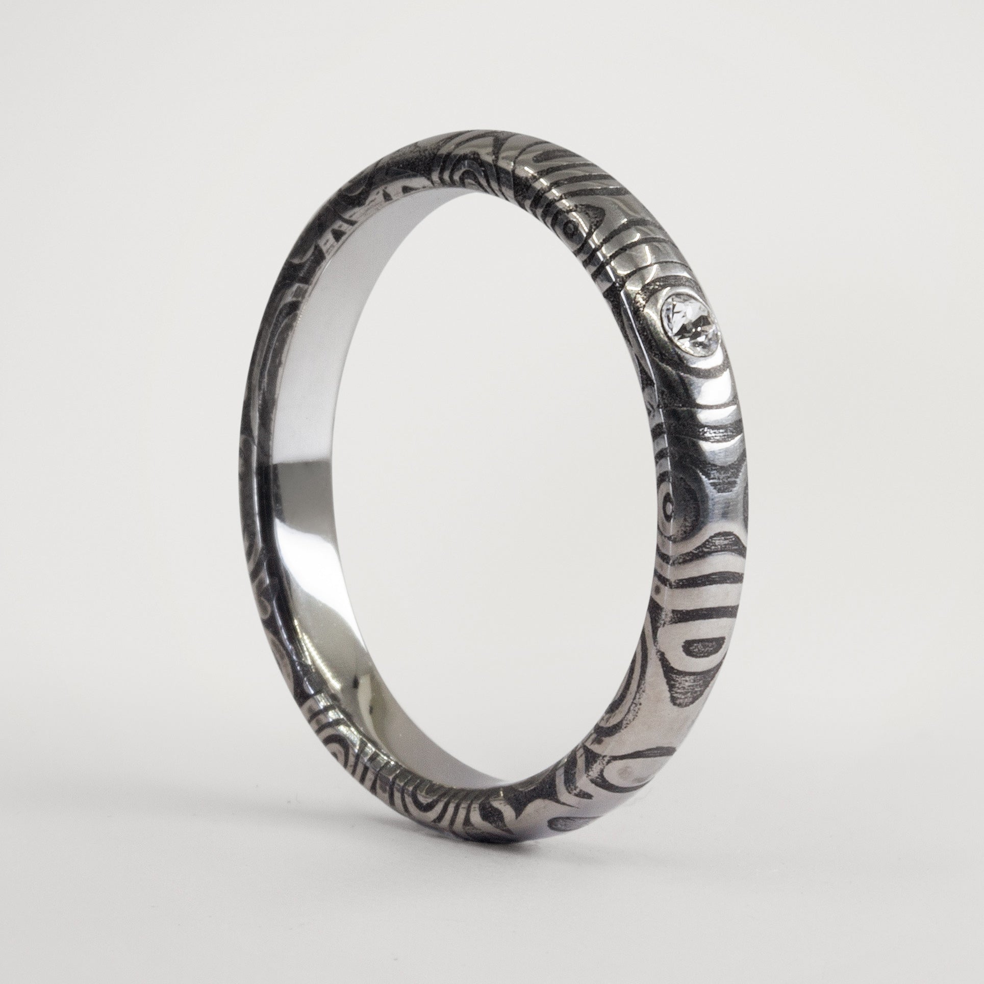 Darkened Damascus steel women Ring