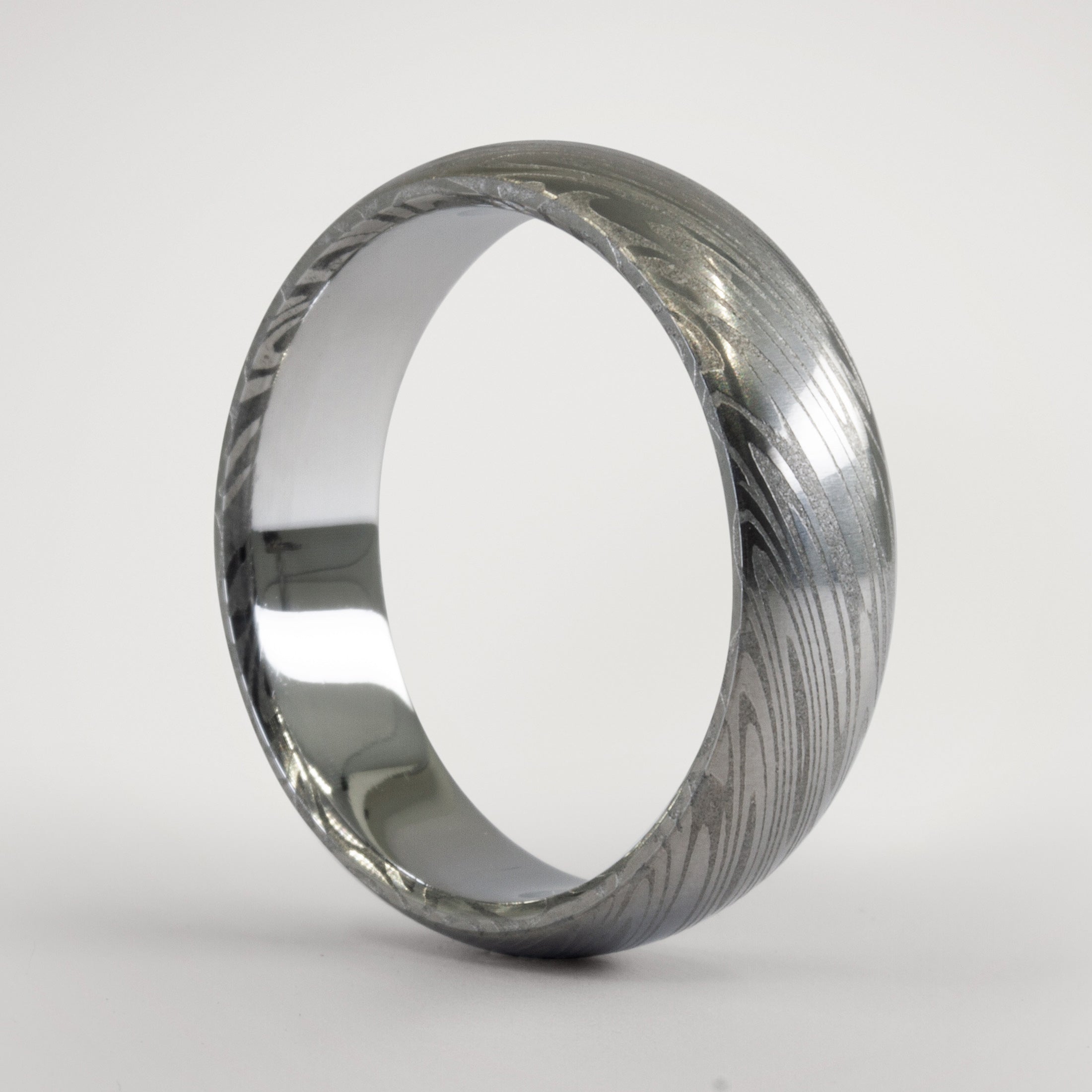 Polished Damascus steel men ring