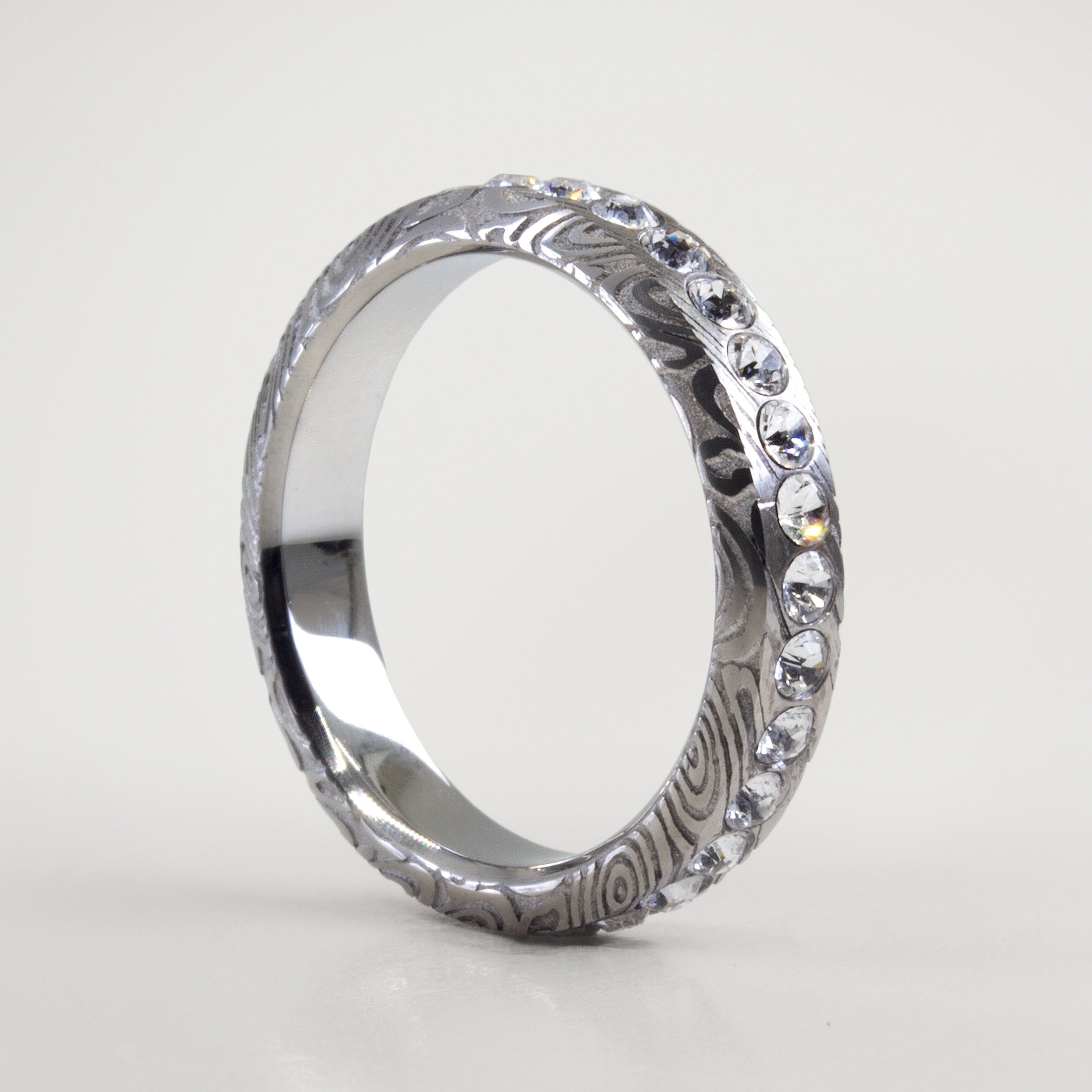 Eternity damascus steel ring
