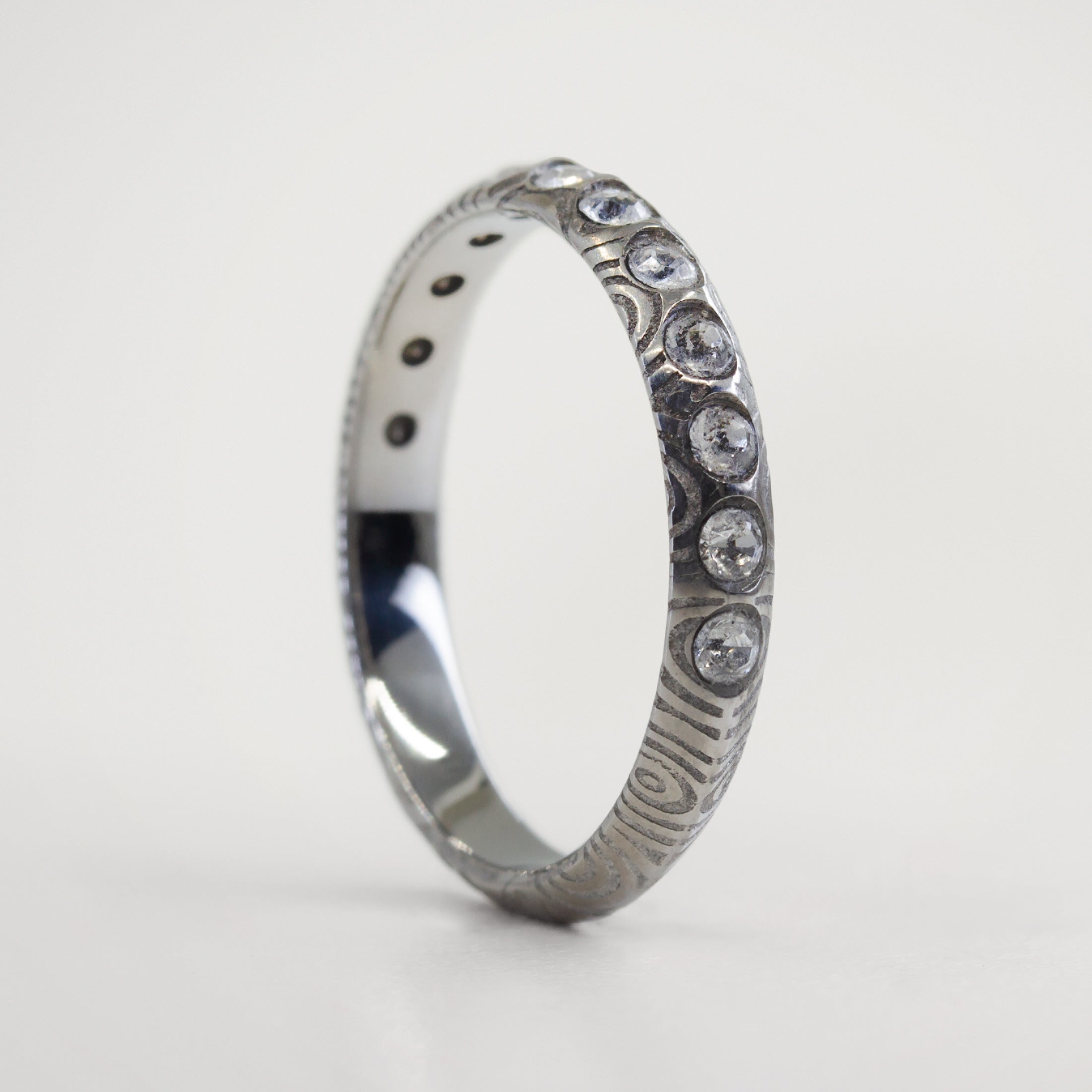 Half Eternity damascus steel ring