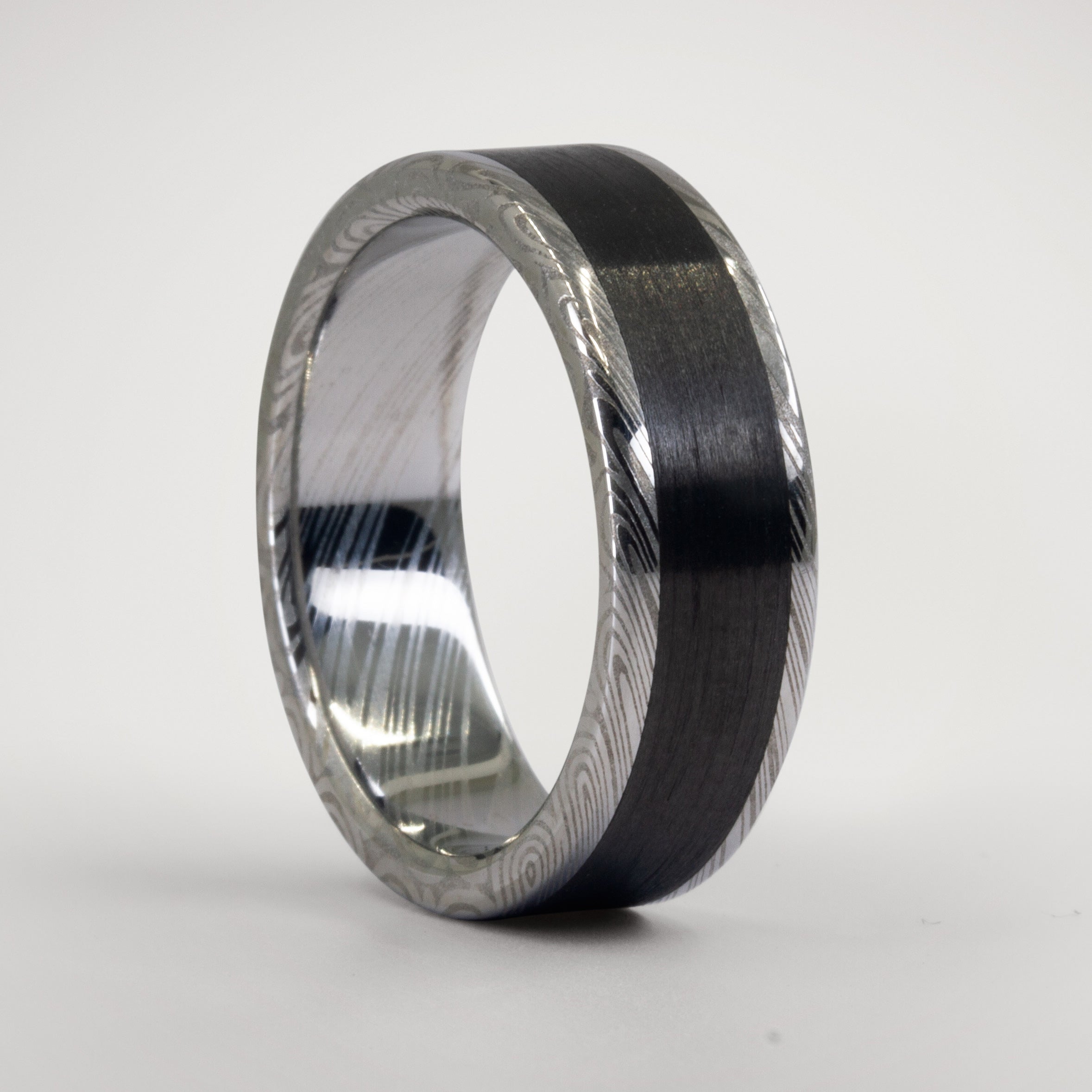 Polished Damascus steel and Carbon fiber women ring