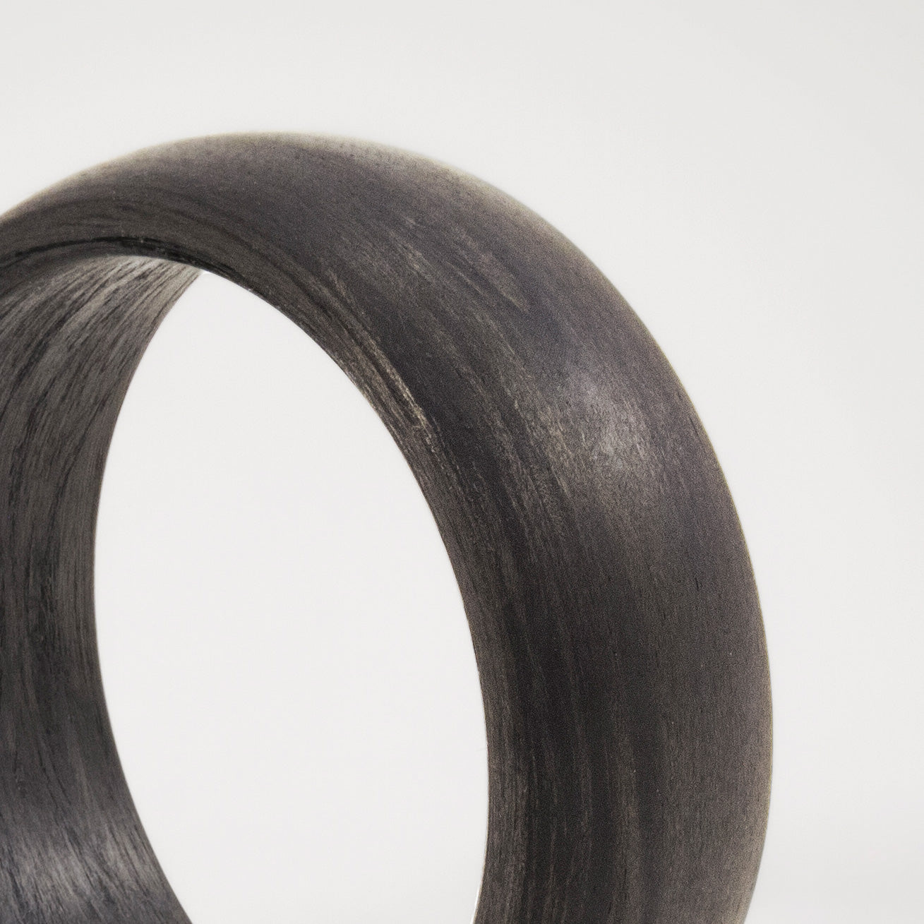 Rounded carbon fiber ring