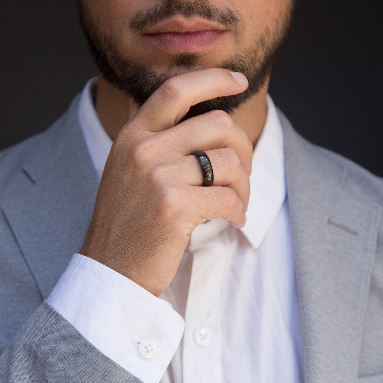 black concrete bronze and wood Ring