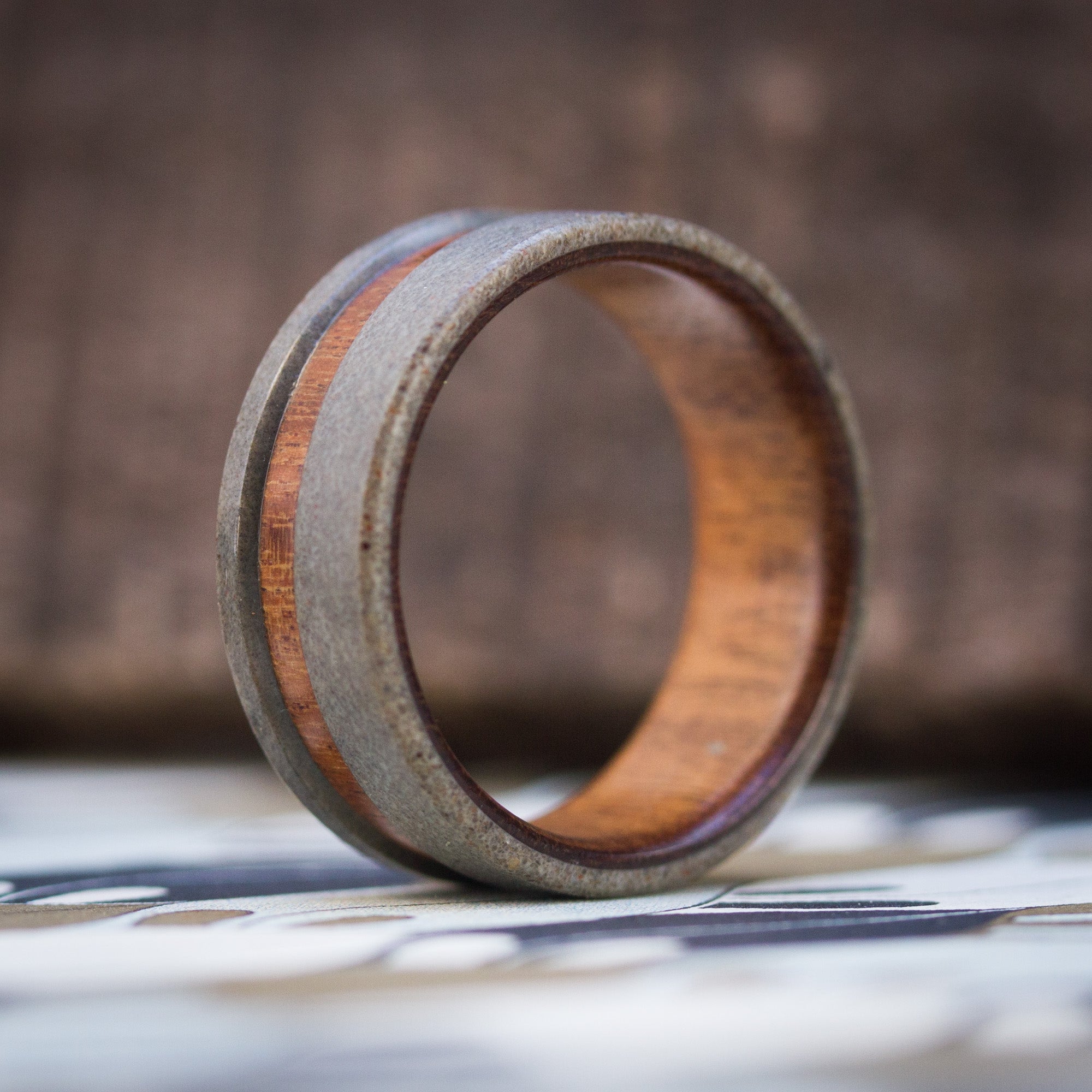 Gray concrete & wood low relief ring