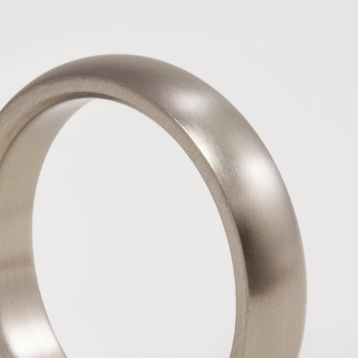 Rounded matte titanium women ring