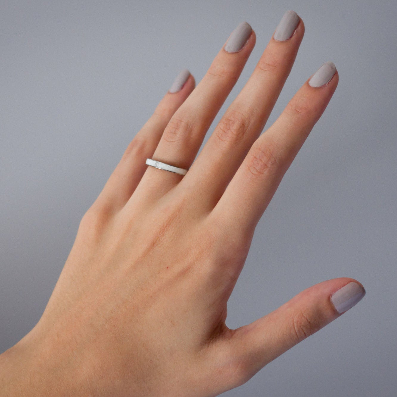 CARRARA MARBLE AND TITANIUM RING WITH WHITE CRYSTAL