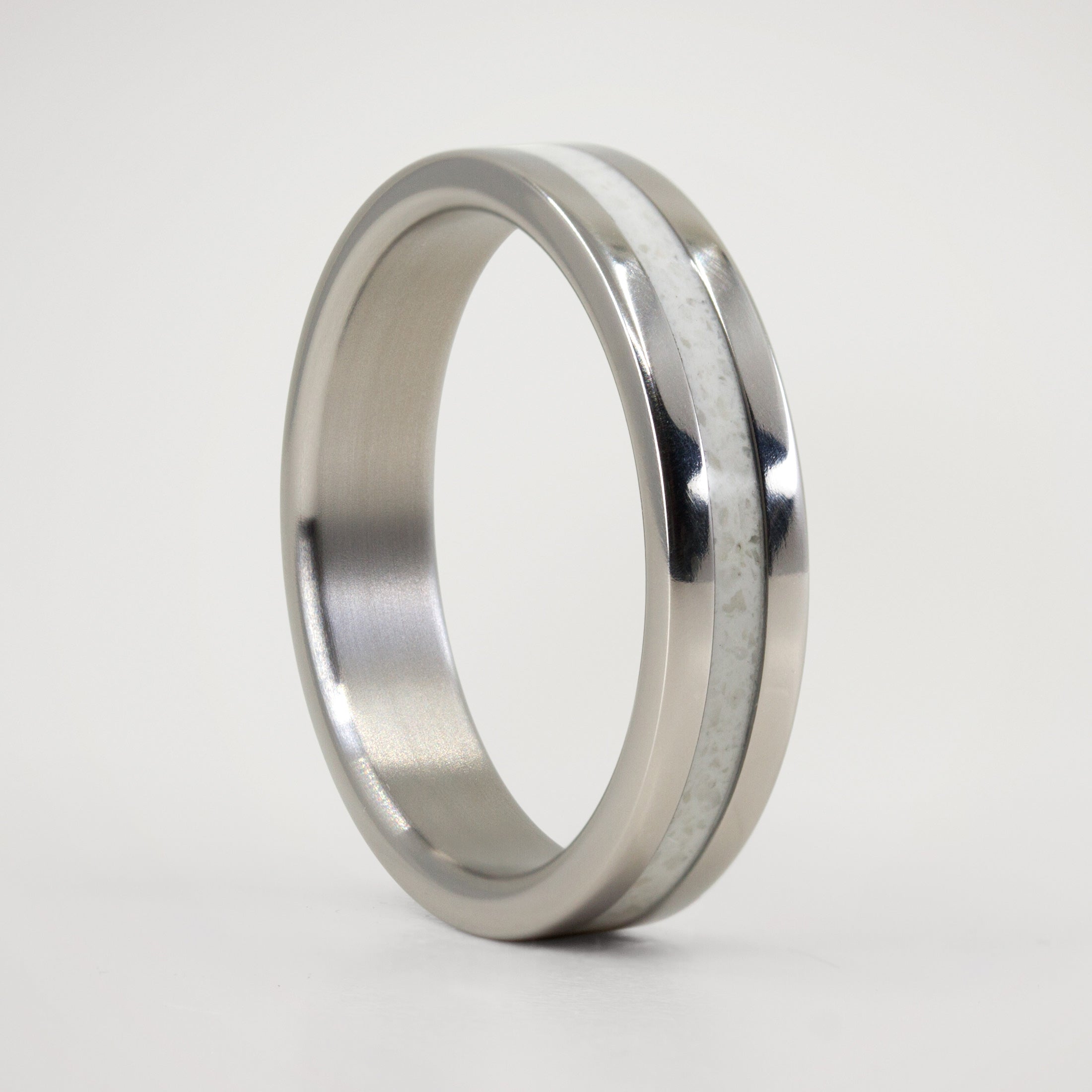Carrara marble and polished titanium Ring