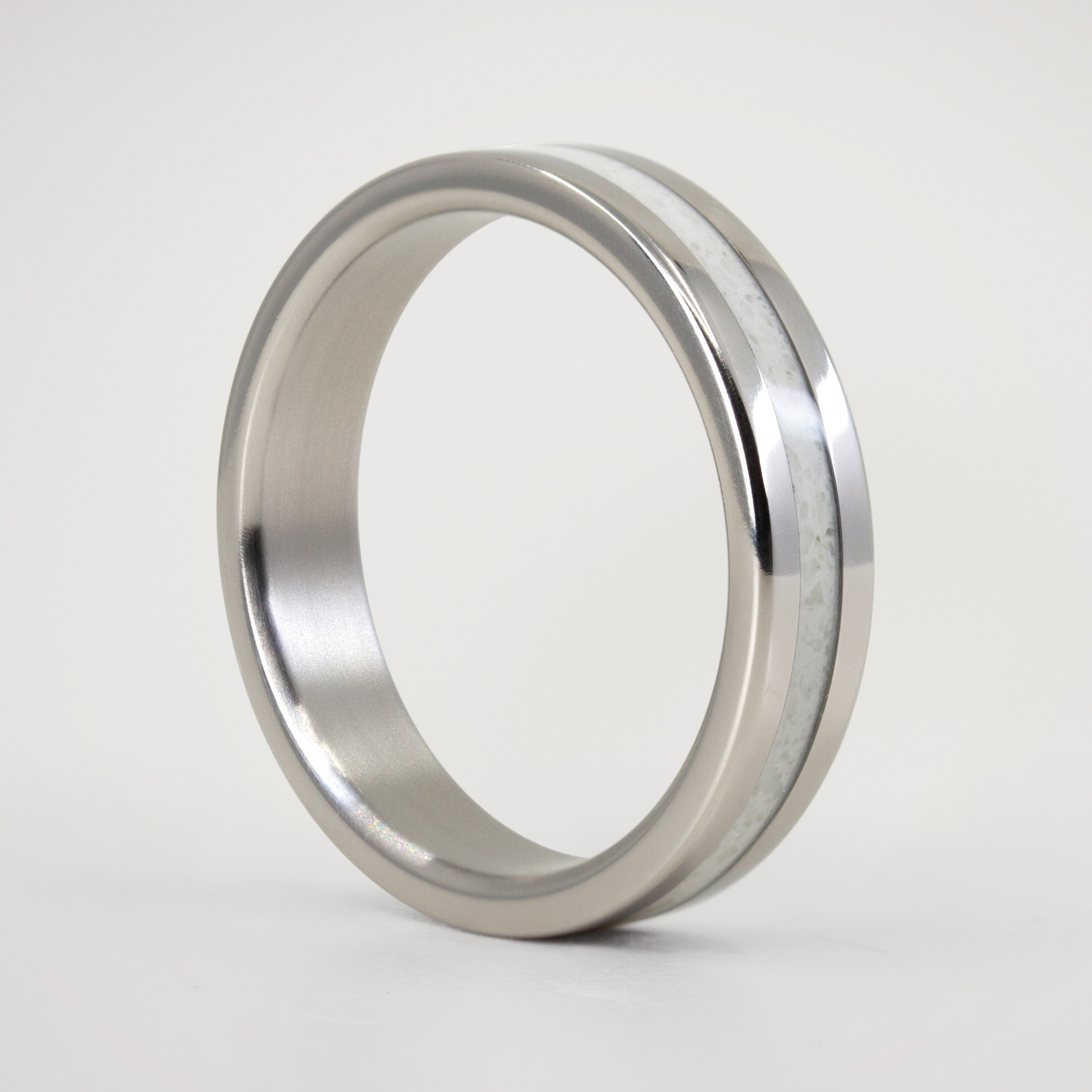 Carrara marble and polished titanium Ring