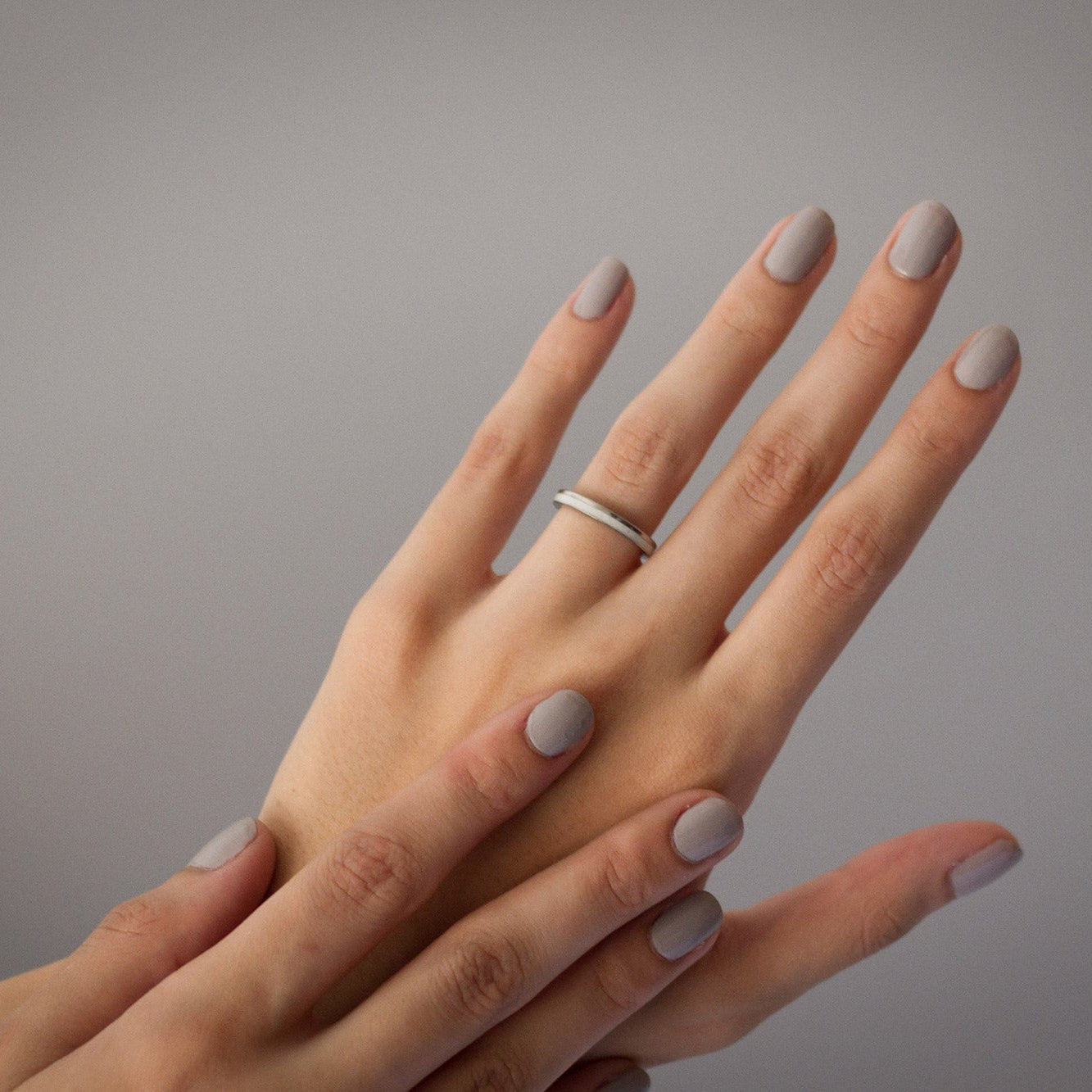 Carrara marble and offset polished titanium Ring