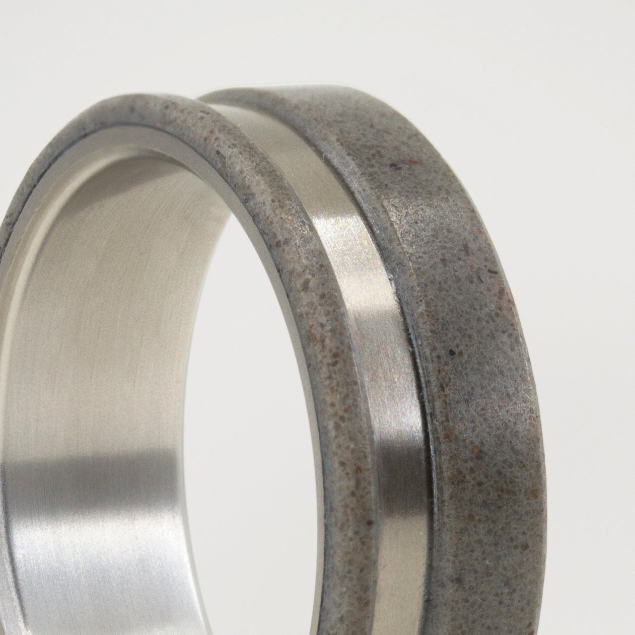 light Gray concrete and titanium ring