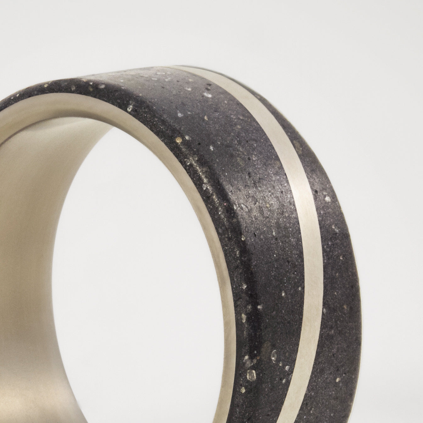 Black concrete with graphite and titanium Ring
