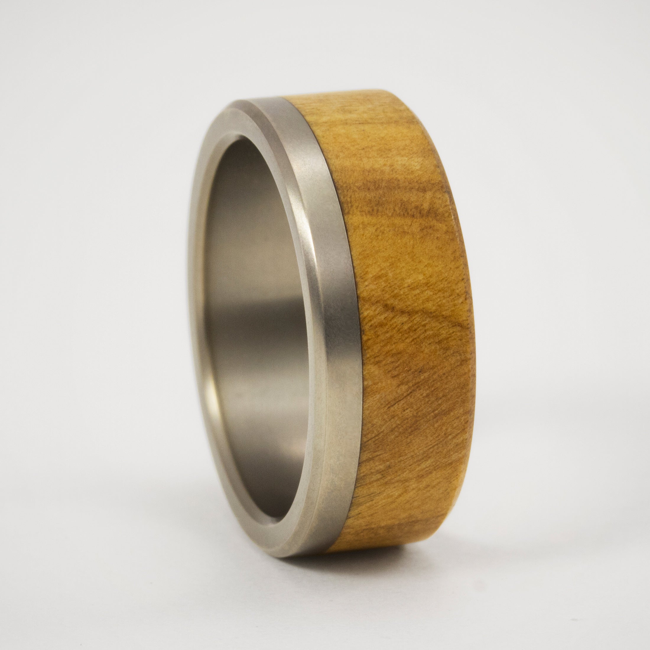 olive wood and matte titanium ring
