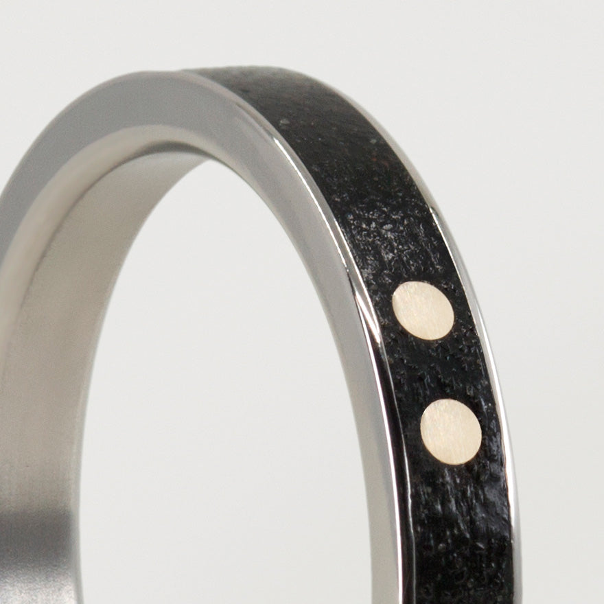 Black concrete and golden dots Ring