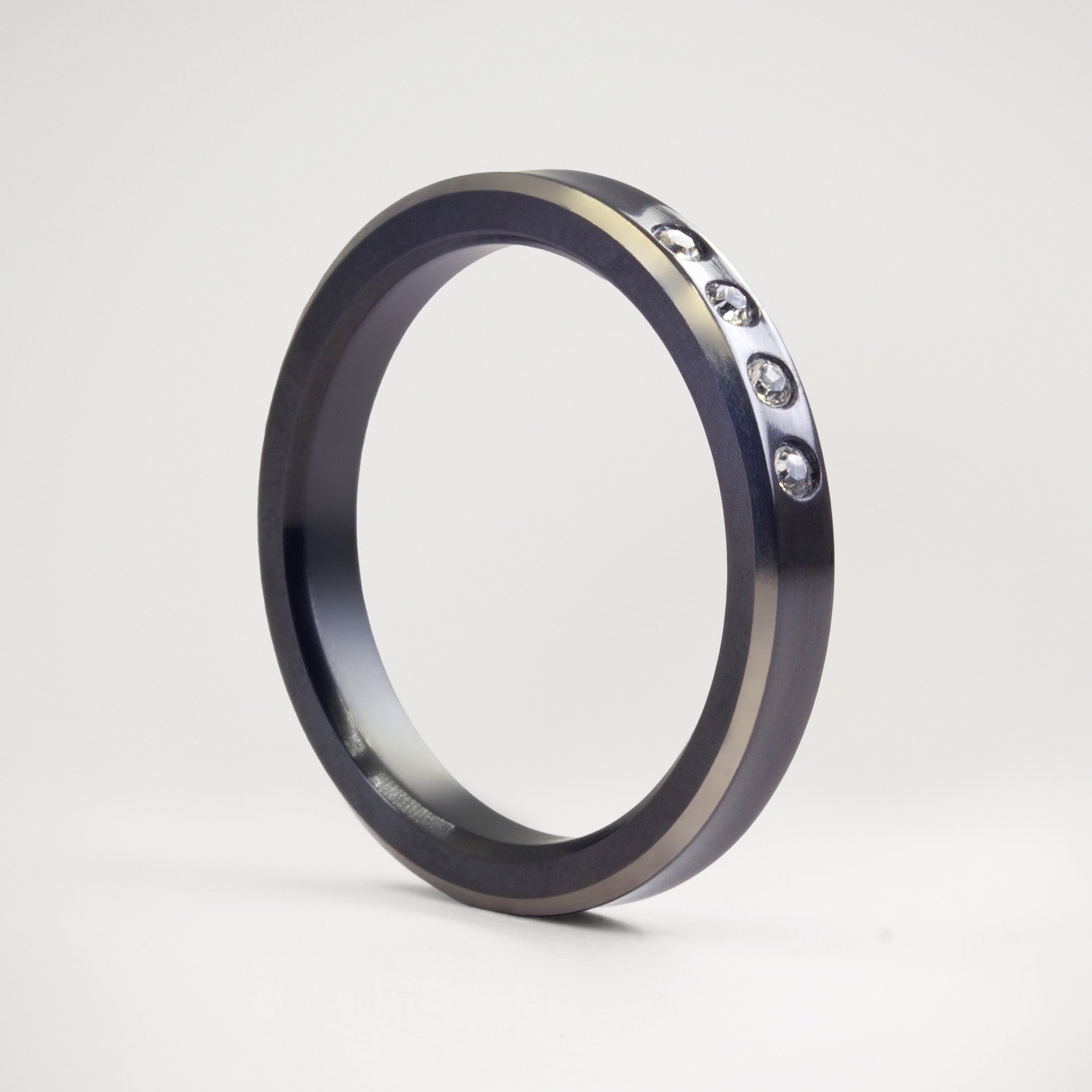 Concave Zirconium with crystals Ring