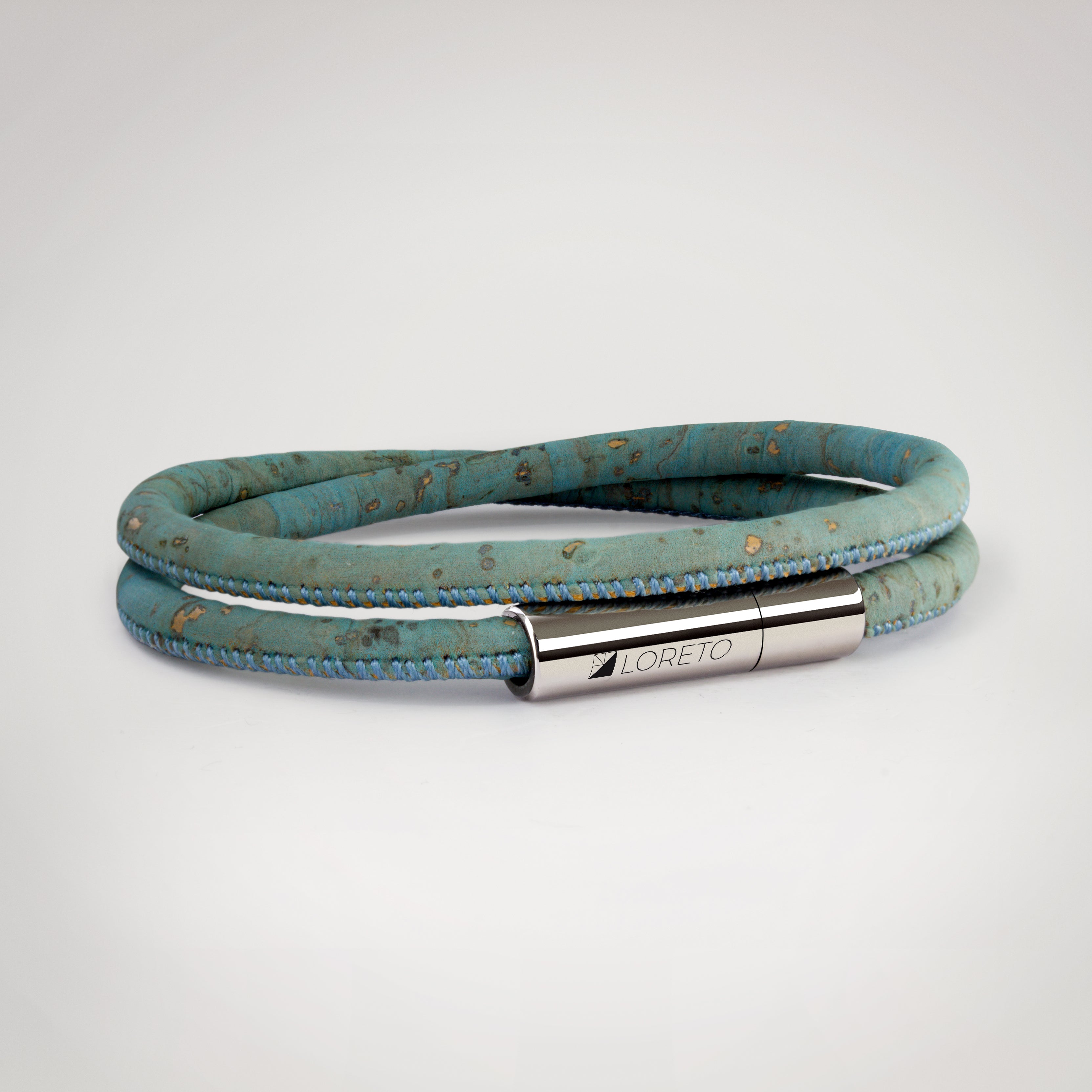 Double blue bracelet made from natural cork fiber and titanium.
