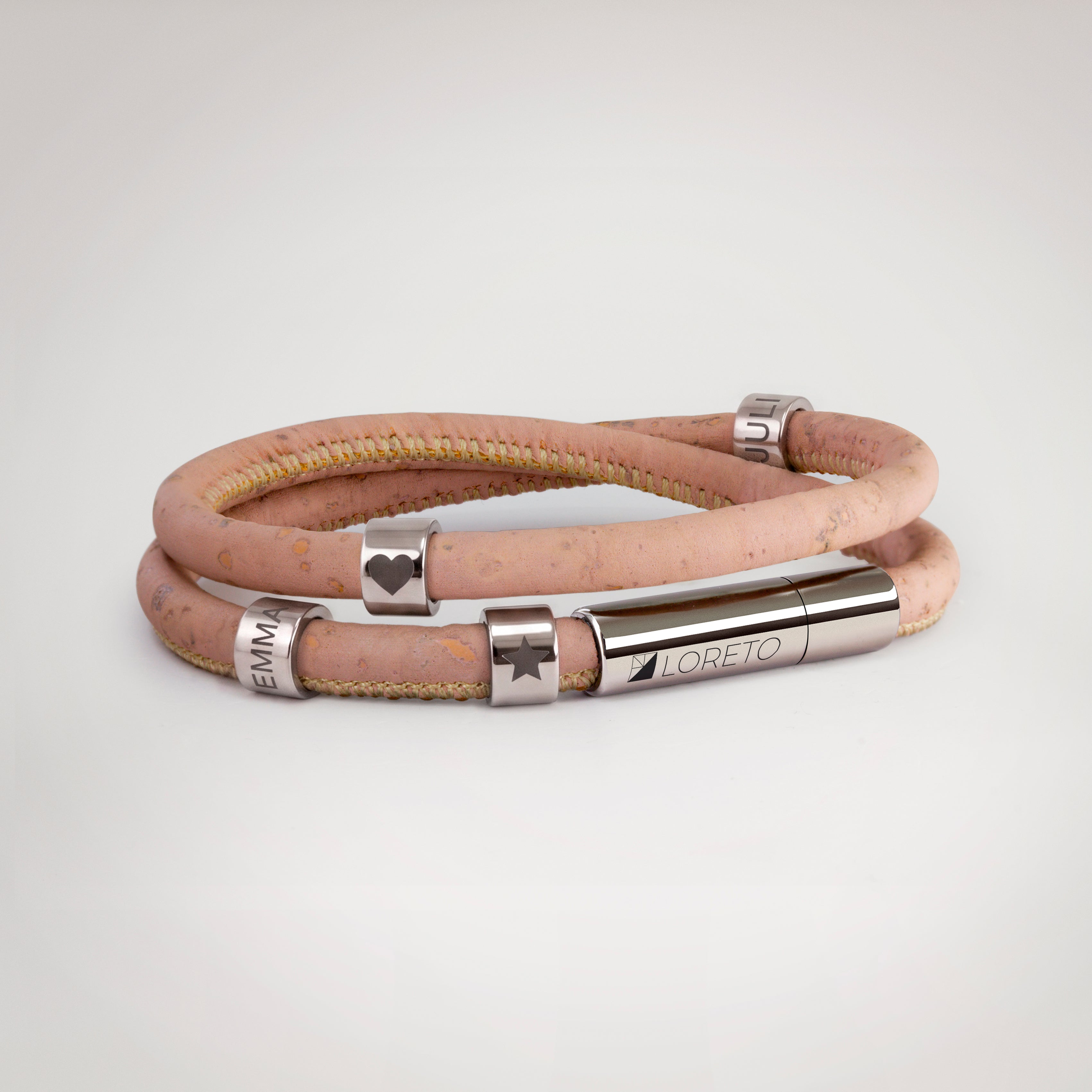 Double pink bracelet made from natural cork fiber and titanium.
