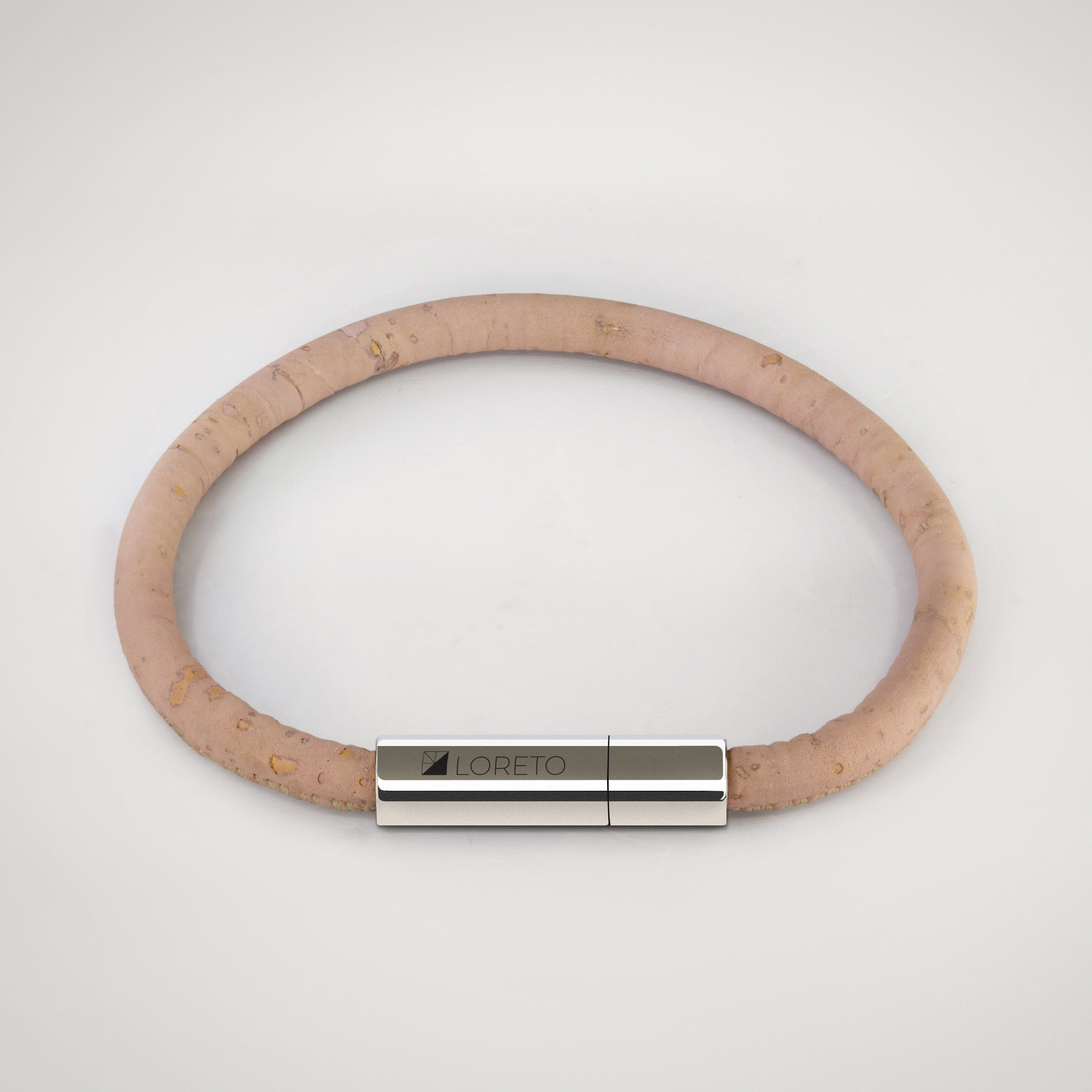 Simple pink bracelet made from natural cork fiber and titanium.