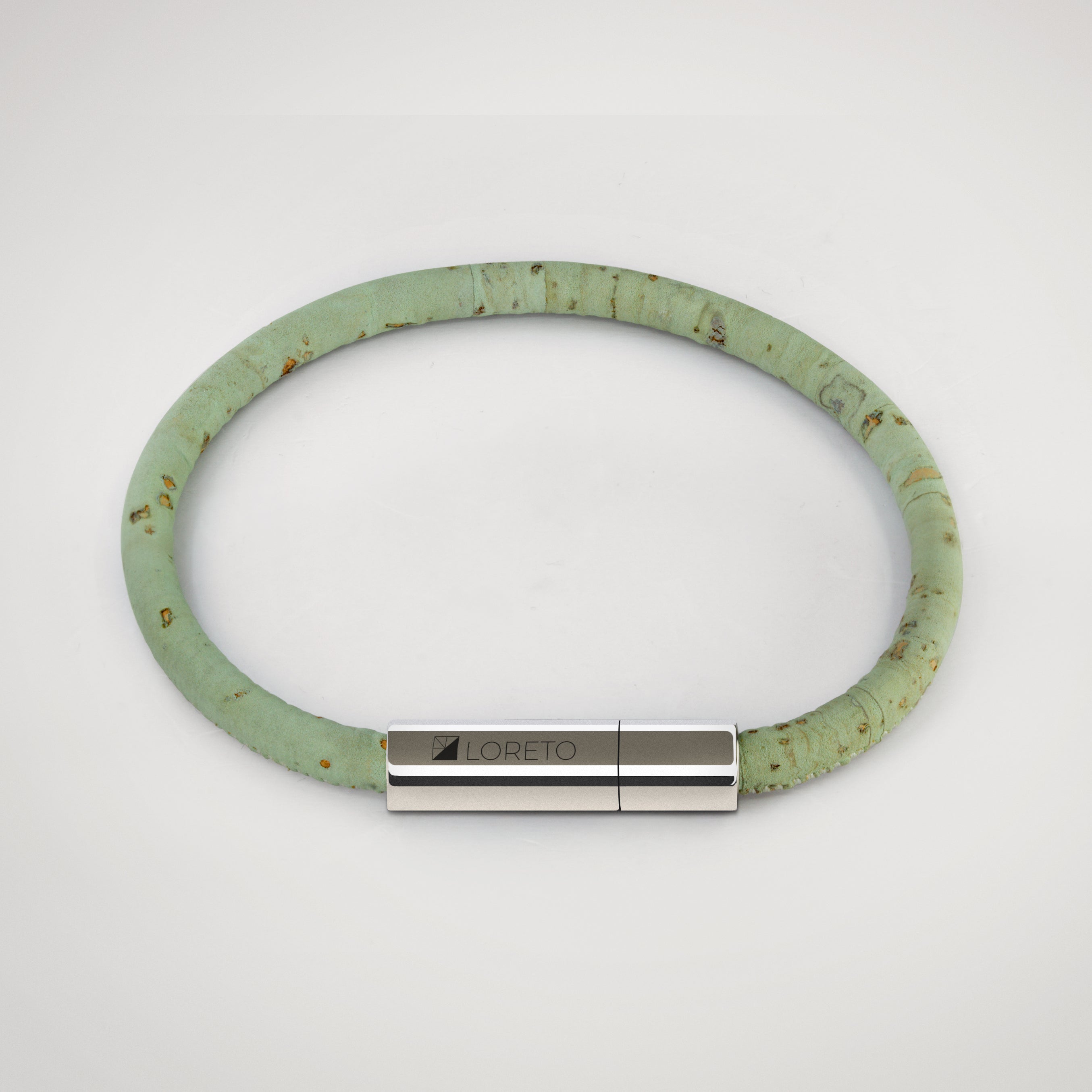 Simple green bracelet made from natural cork fiber and titanium.