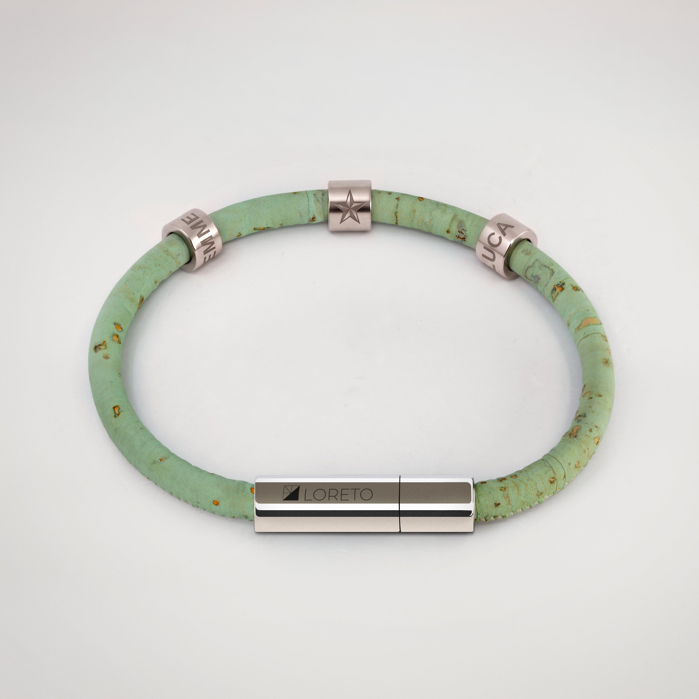Simple green bracelet made from natural cork fiber and titanium.