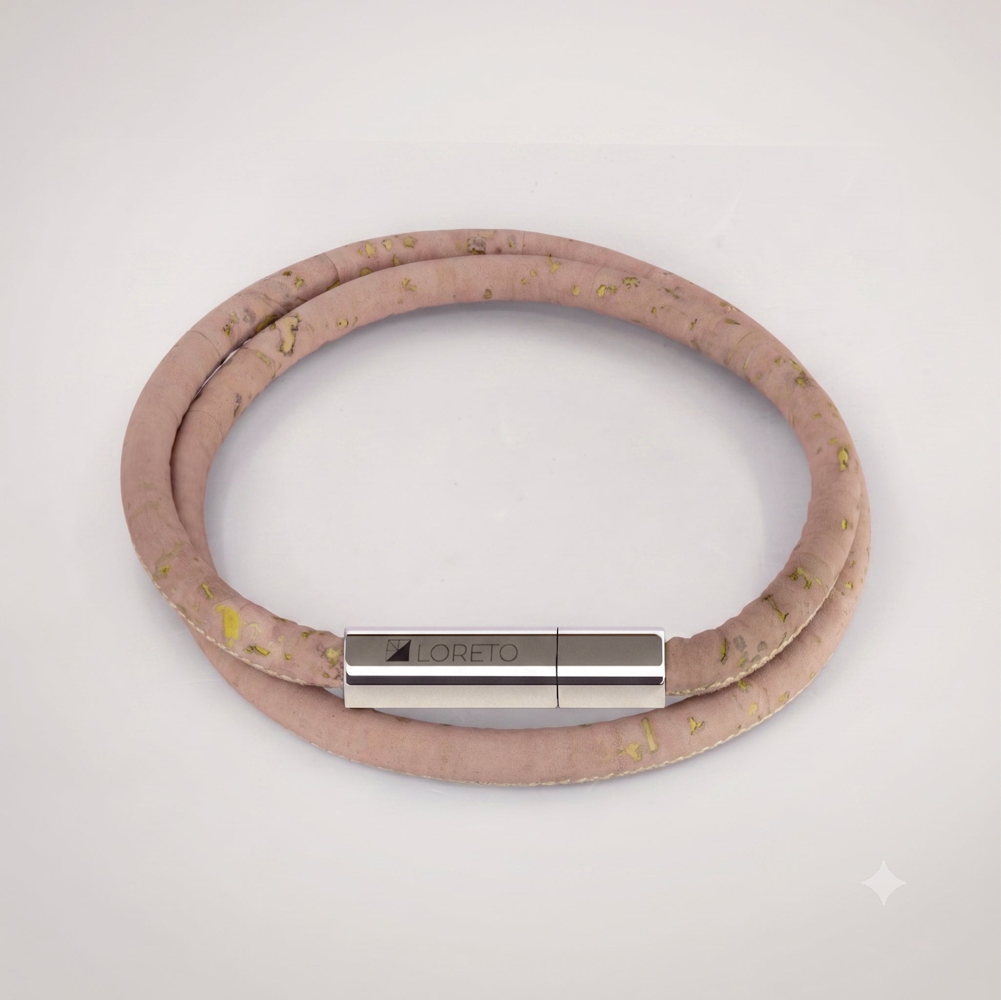 Double pink bracelet made from natural cork fiber and titanium.