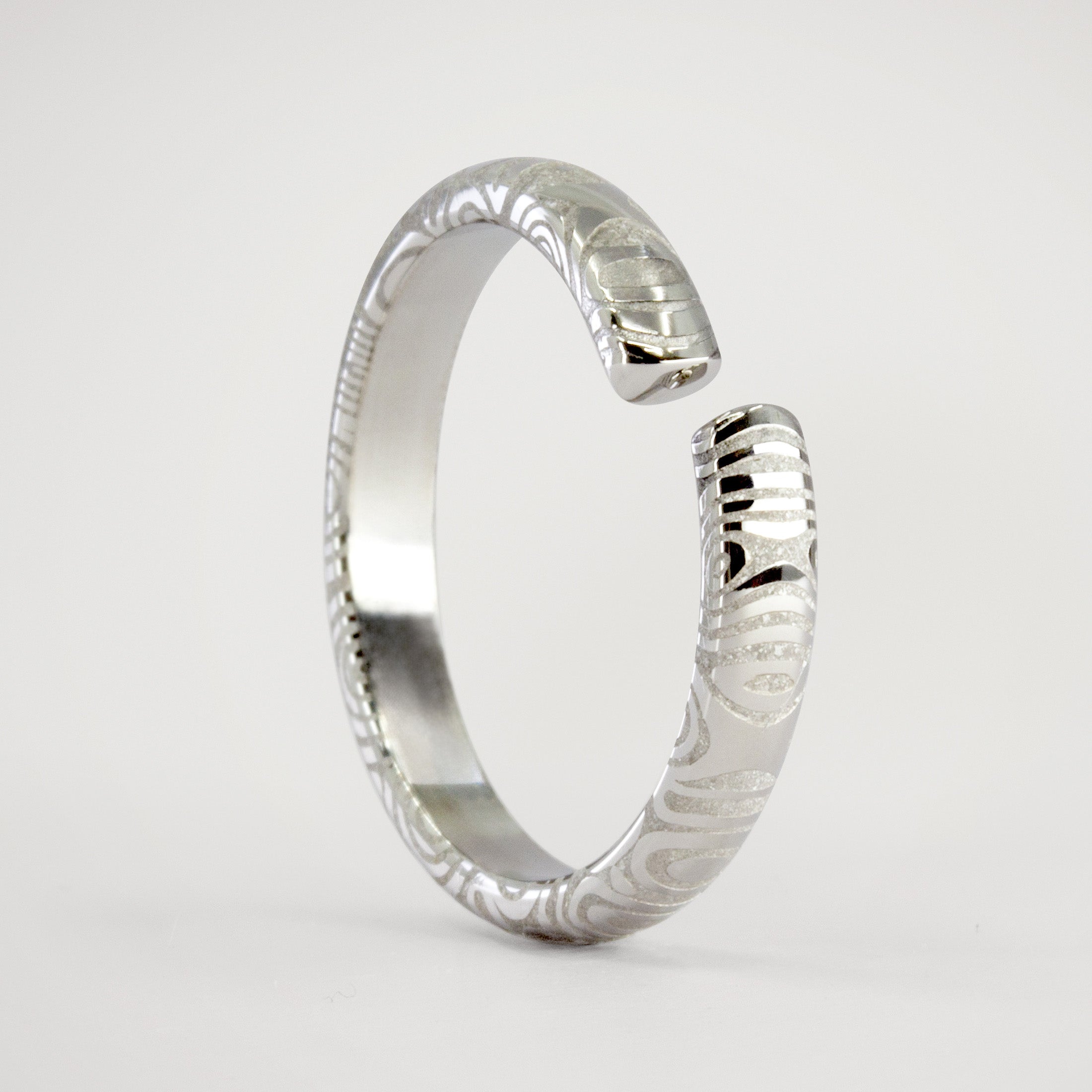 Split damascus steel ring