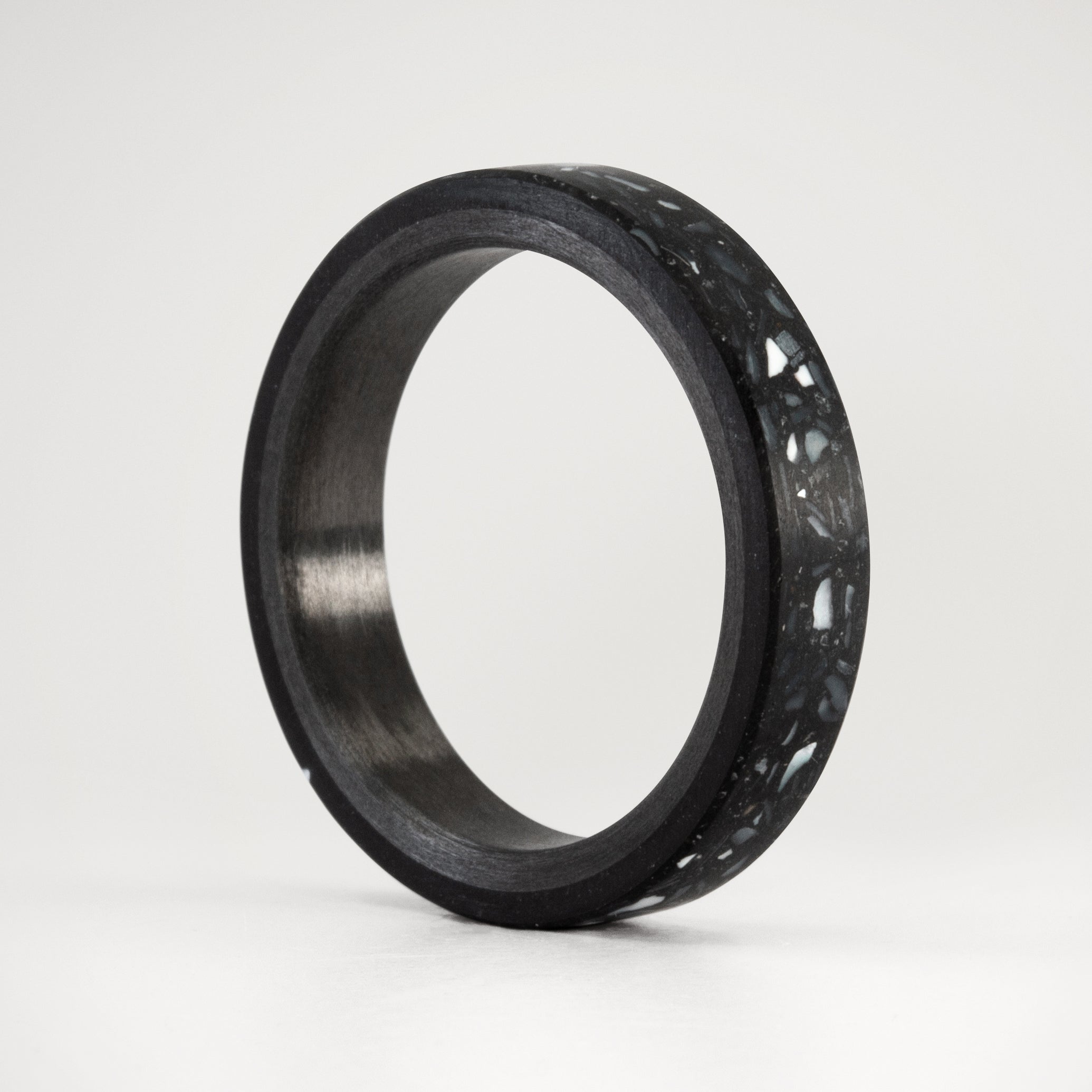 pearly black concrete and carbon fiber ring