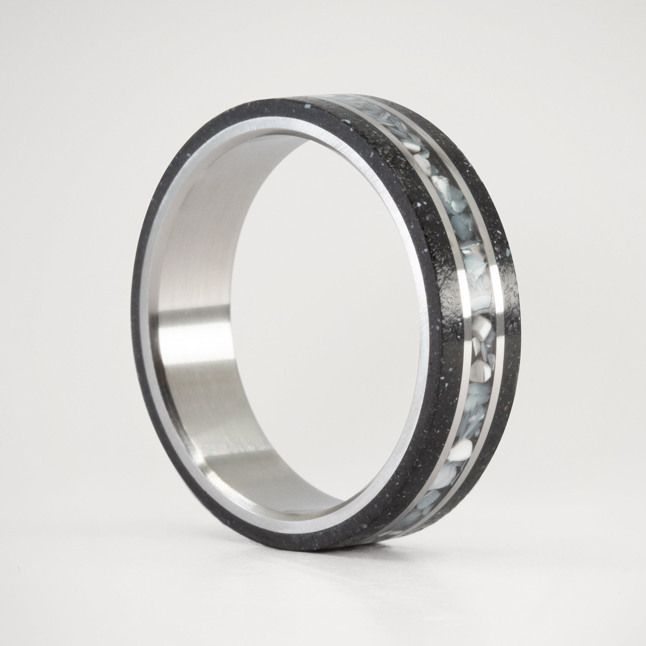 Nacre black concrete and titanium ring