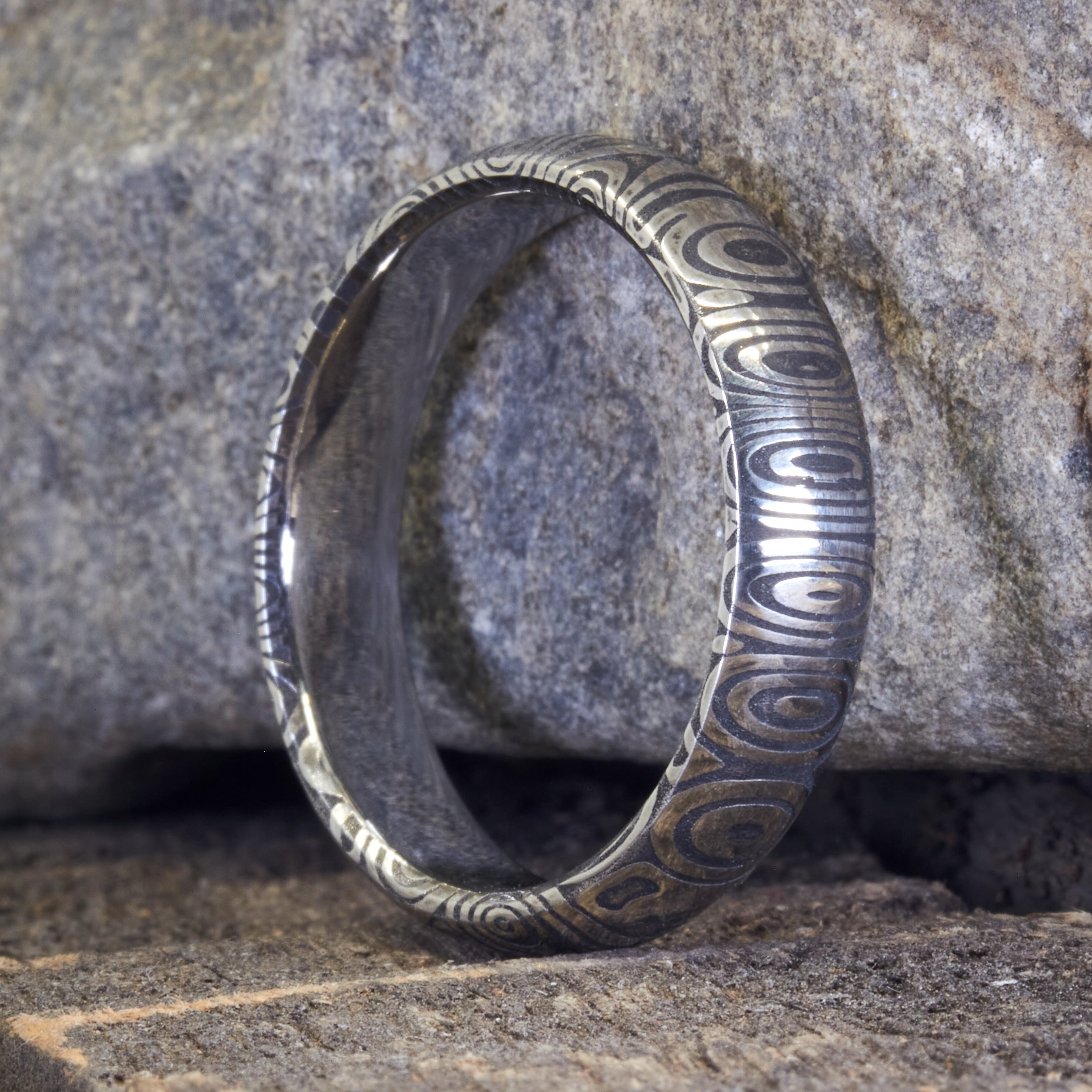 Darkened Damascus steel men Ring