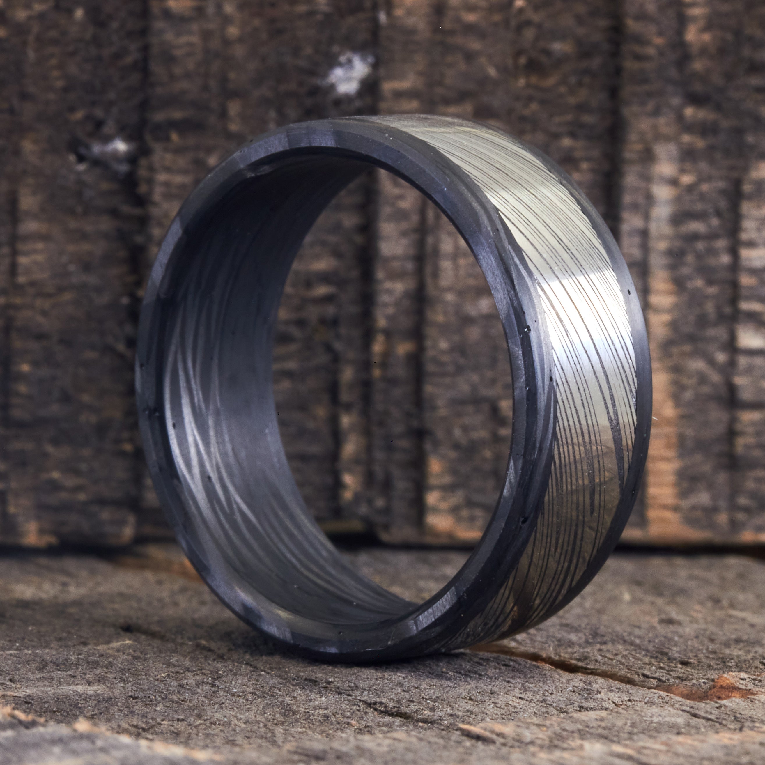 Darkened Damascus steel & wavy carbon fiber men ring