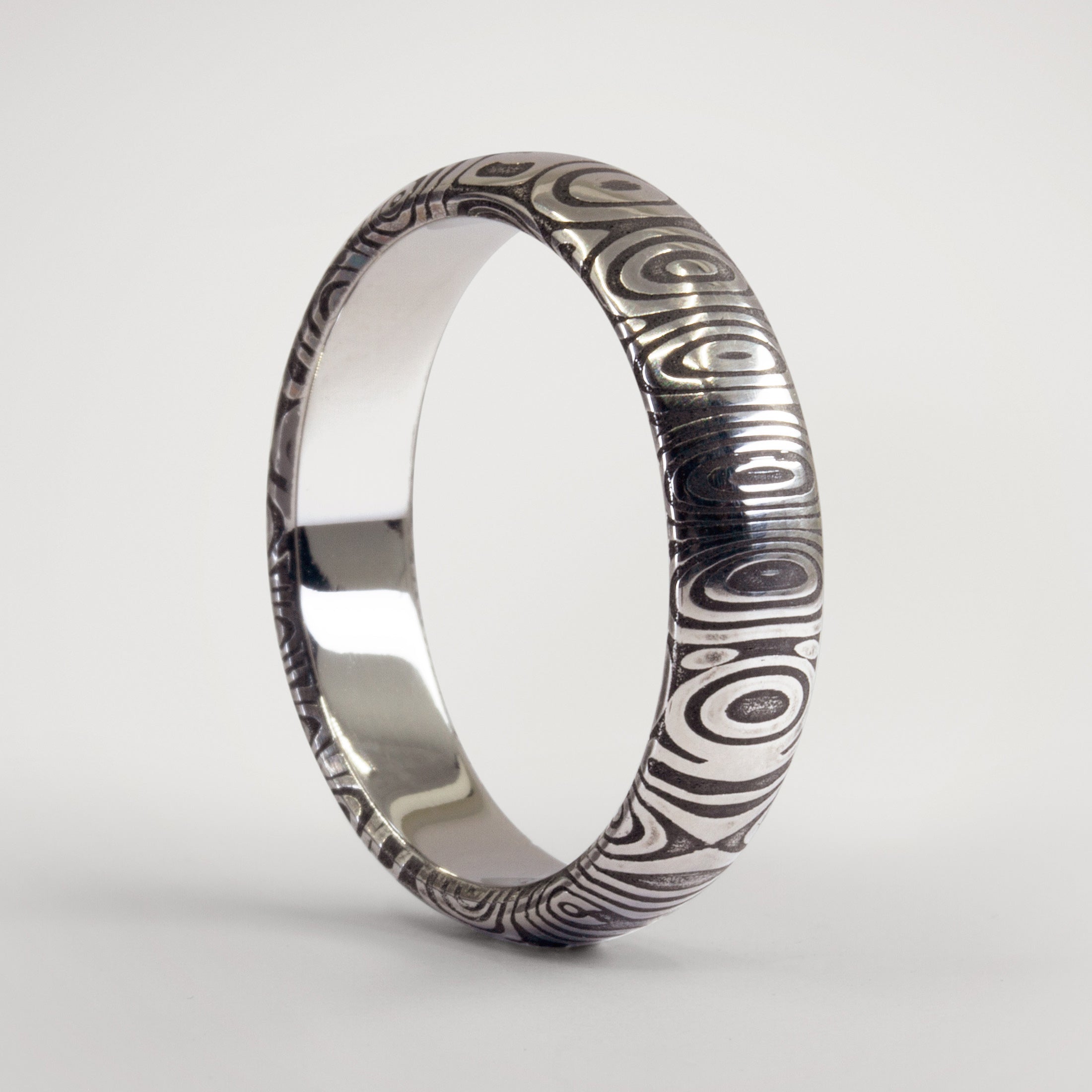 Darkened Damascus steel men Ring