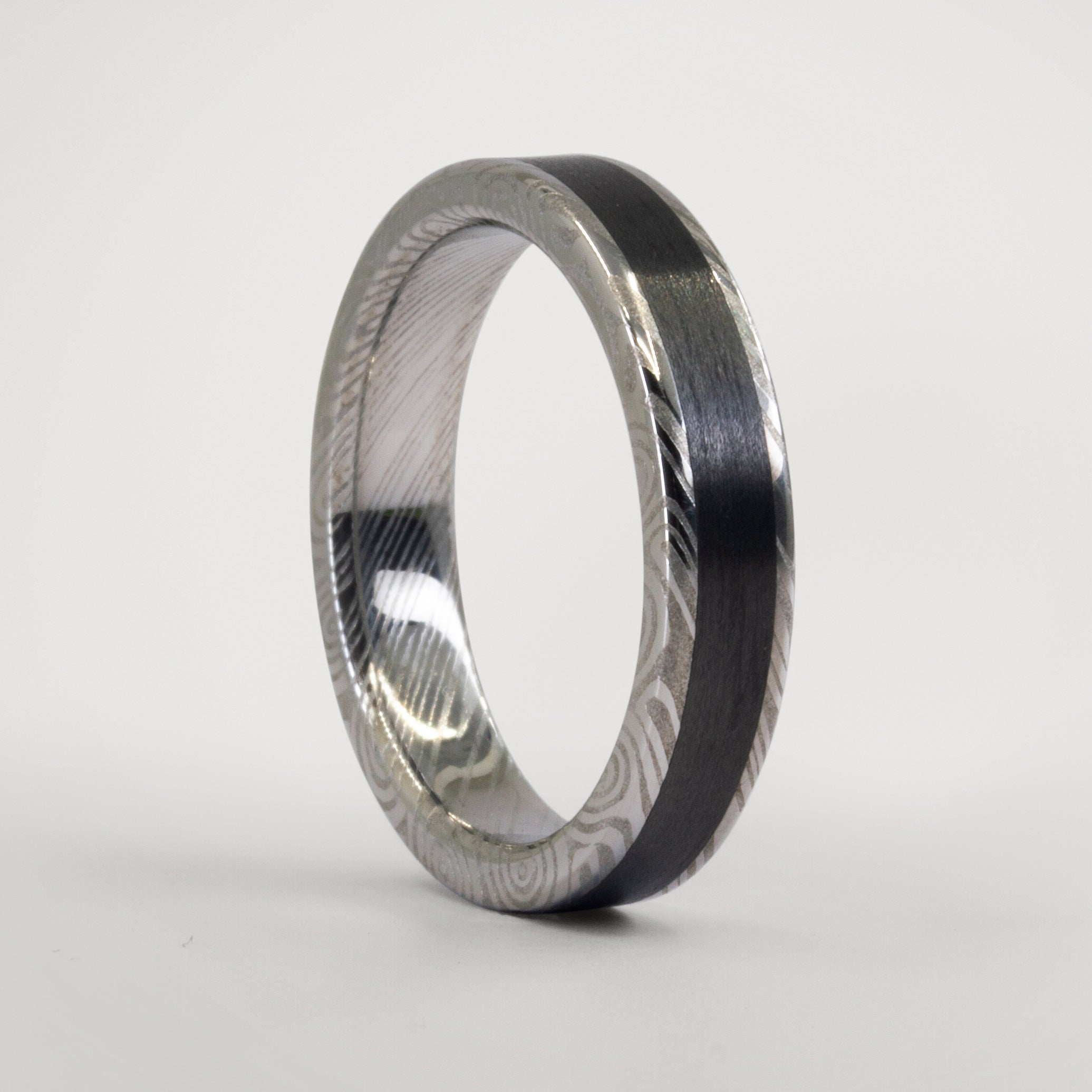 Polished Damascus steel and Carbon fiber women ring