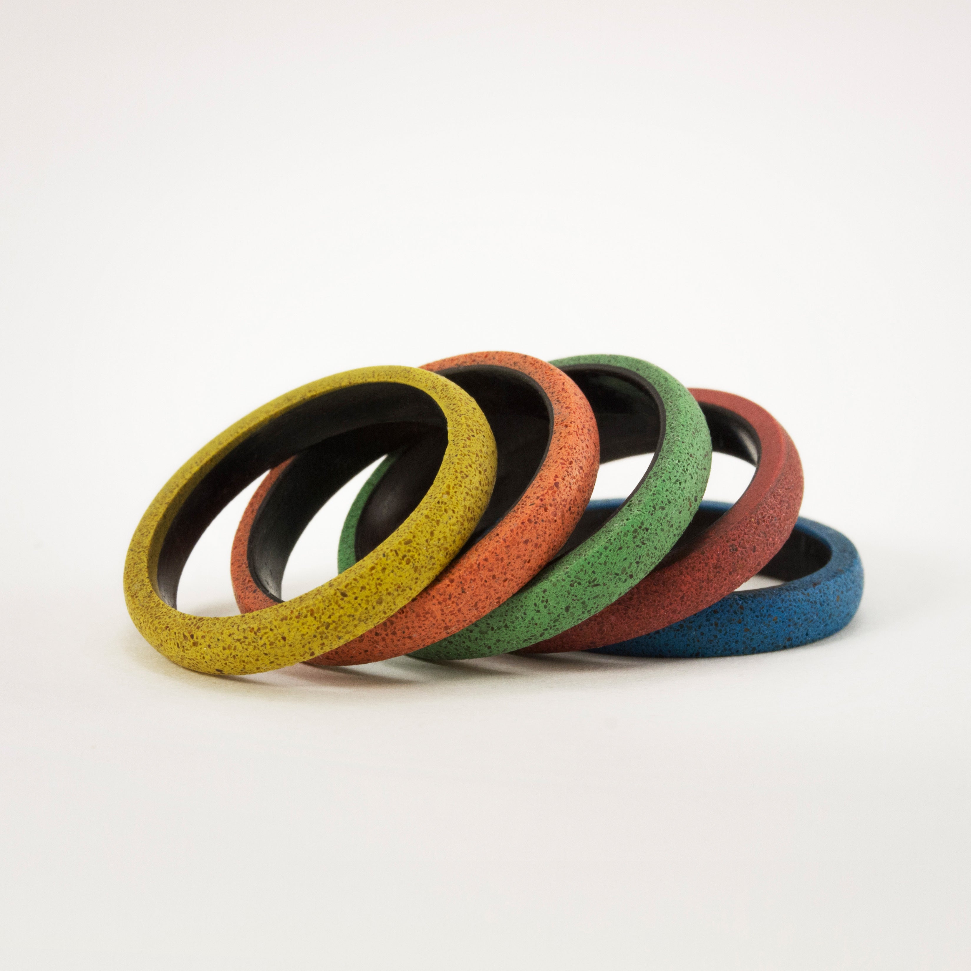 yellow concrete and carbon fiber ring