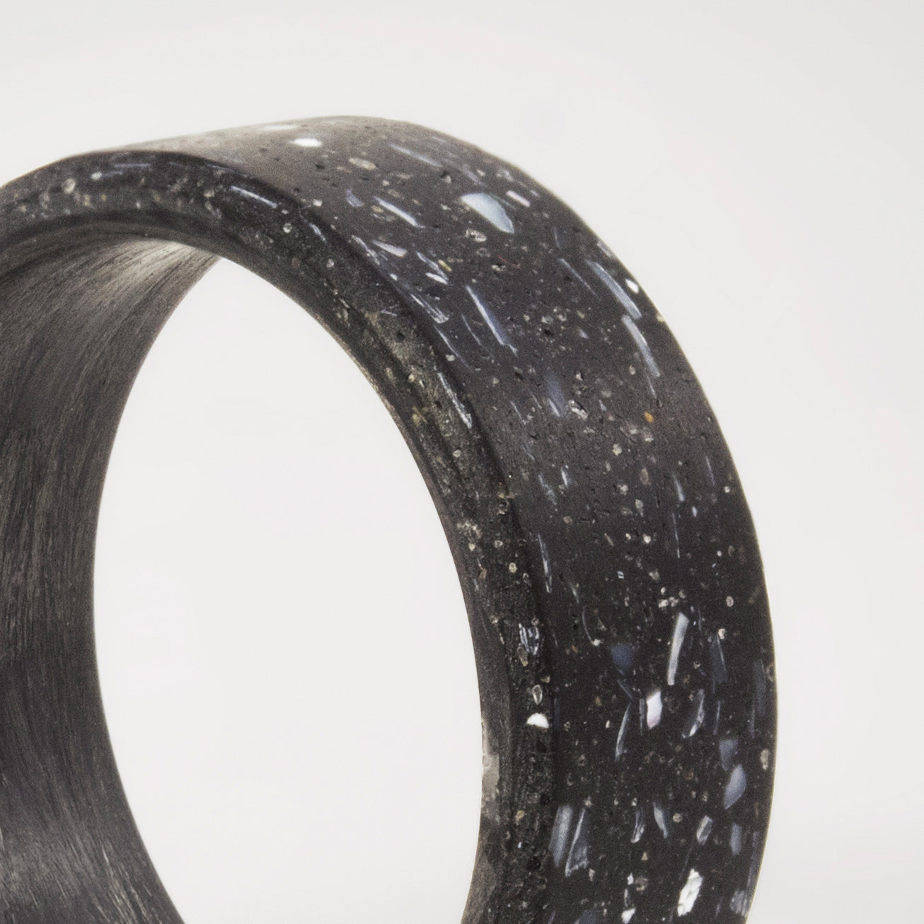 pearly black concrete and carbon fiber ring