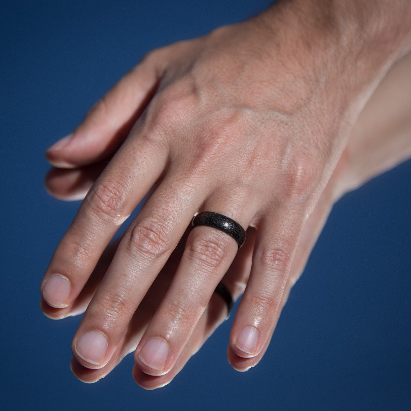 black concrete bronze and wood Ring