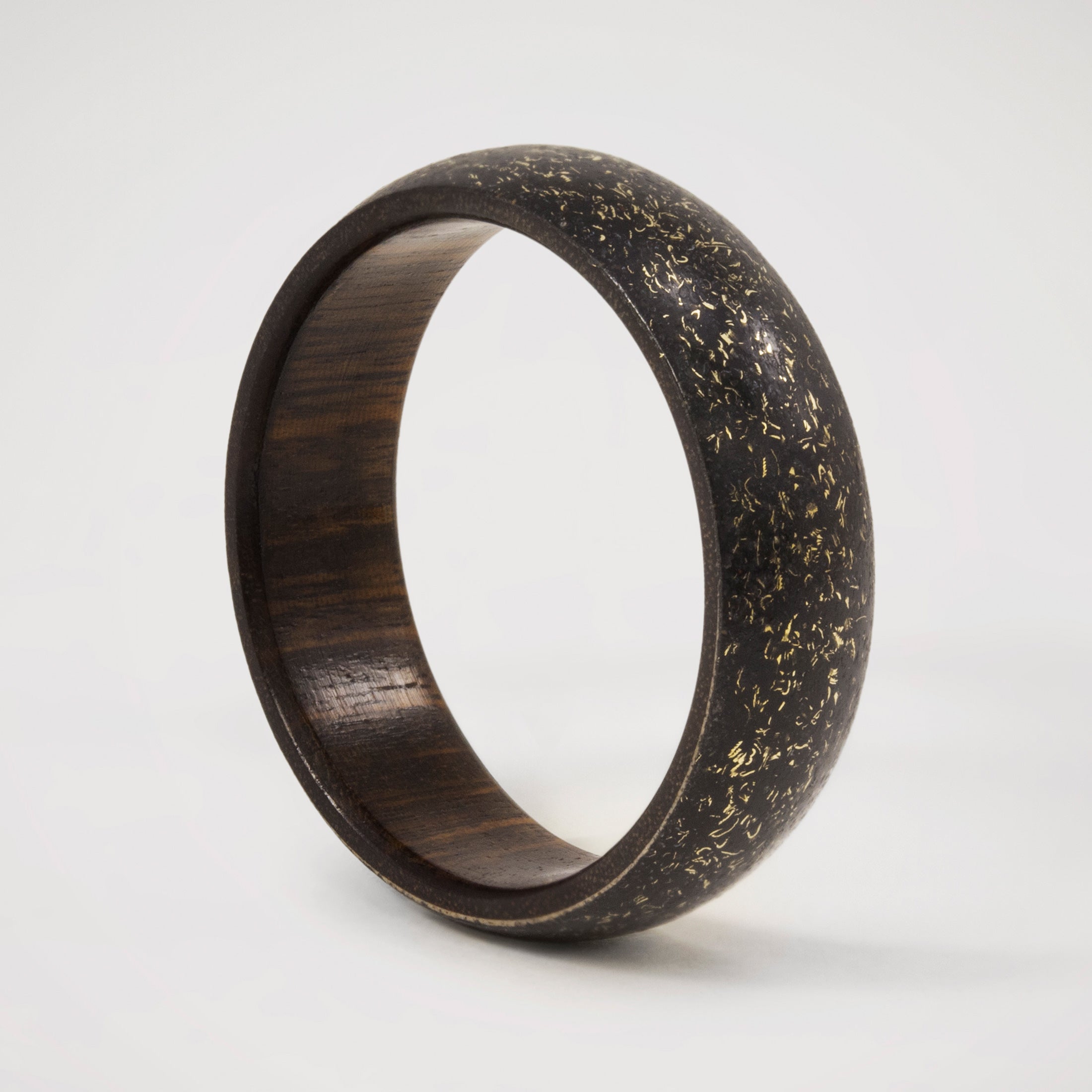 black concrete, bronze and wood Ring