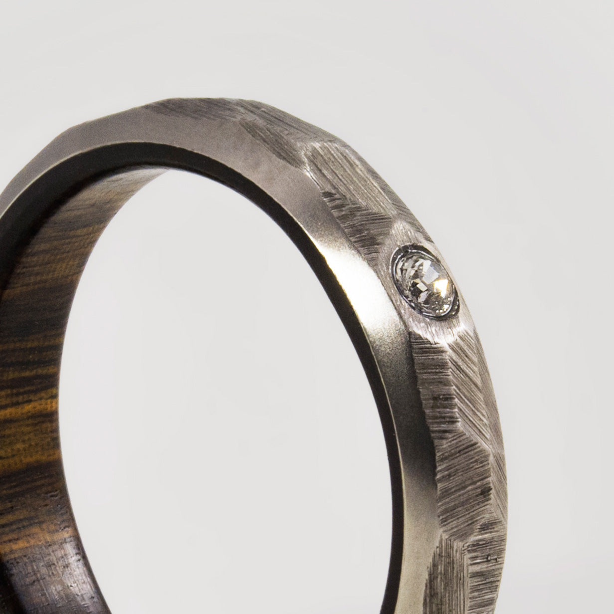 Hammered titanium and wood with crystal ring